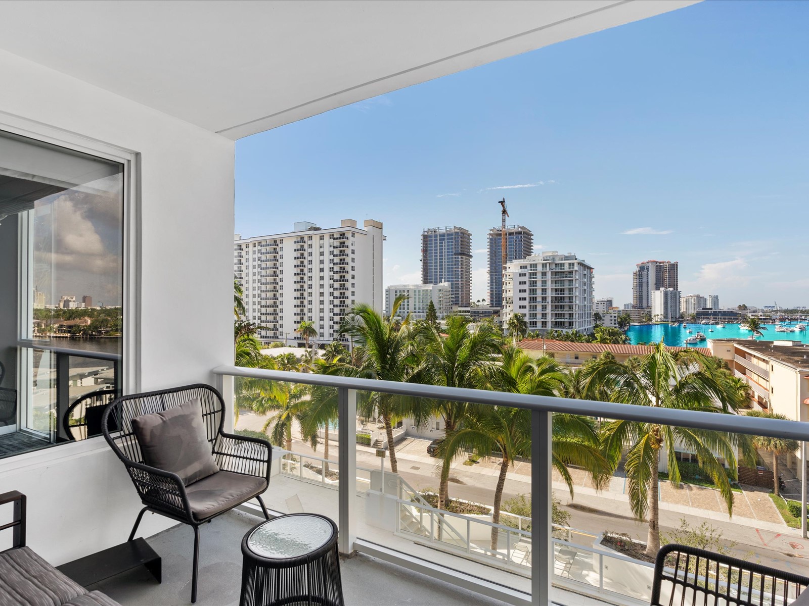 401 North Birch Road, Unit 603 Fort Lauderdale, FL 33304 - Photo 16 of 16 a view of a balcony with chairs
