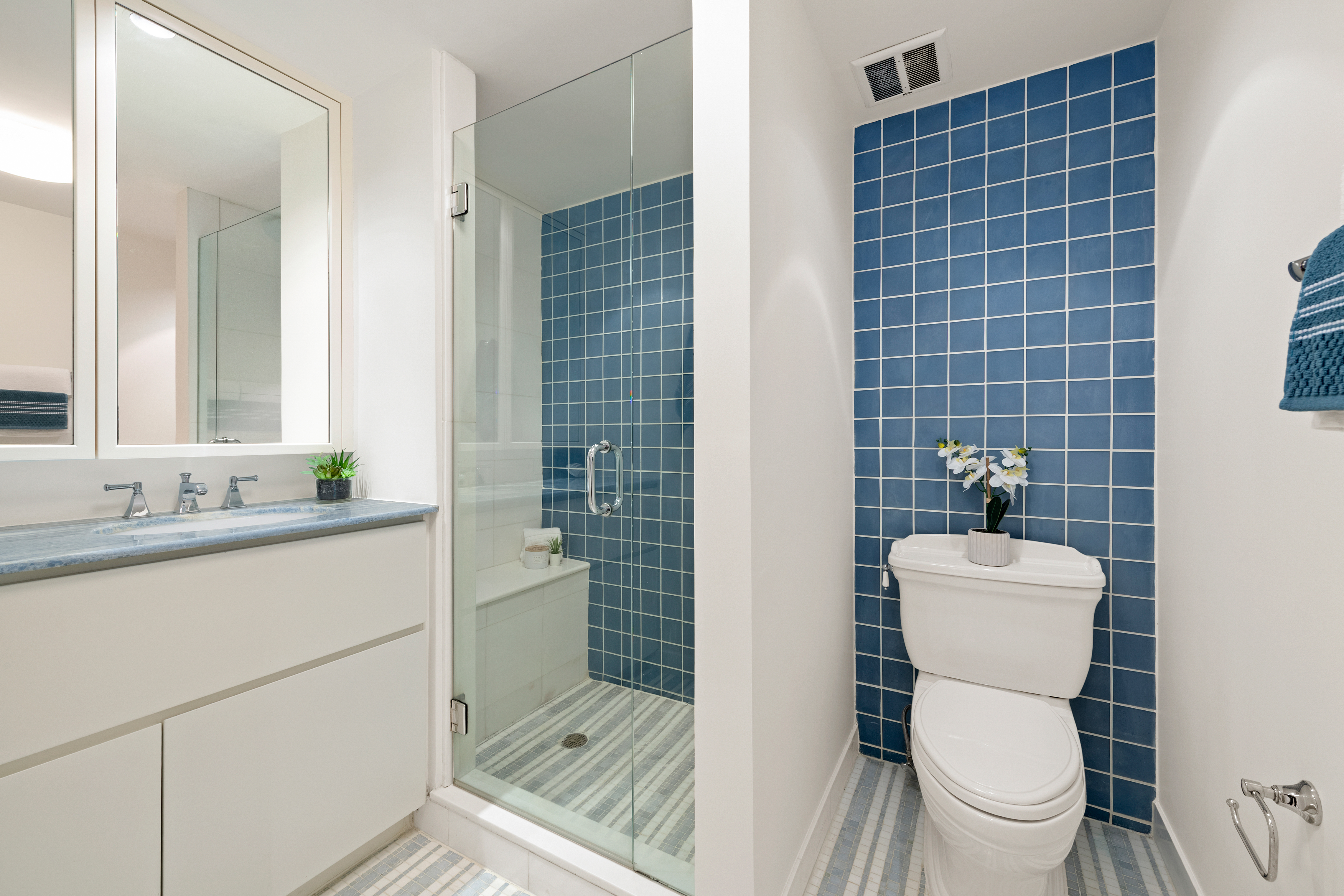 336 West End Avenue, Unit 7CD Manhattan, NY 10023 - Photo 11 of 16 a bathroom with a sink a toilet a mirror and shower