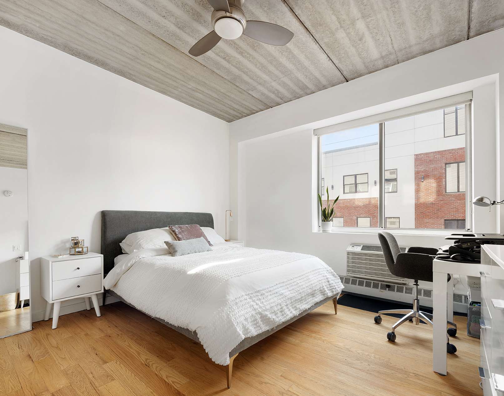 529 Court Street, Unit 204 Brooklyn, NY 11231 - Photo 6 of 9 a bedroom with a bed and wooden floor