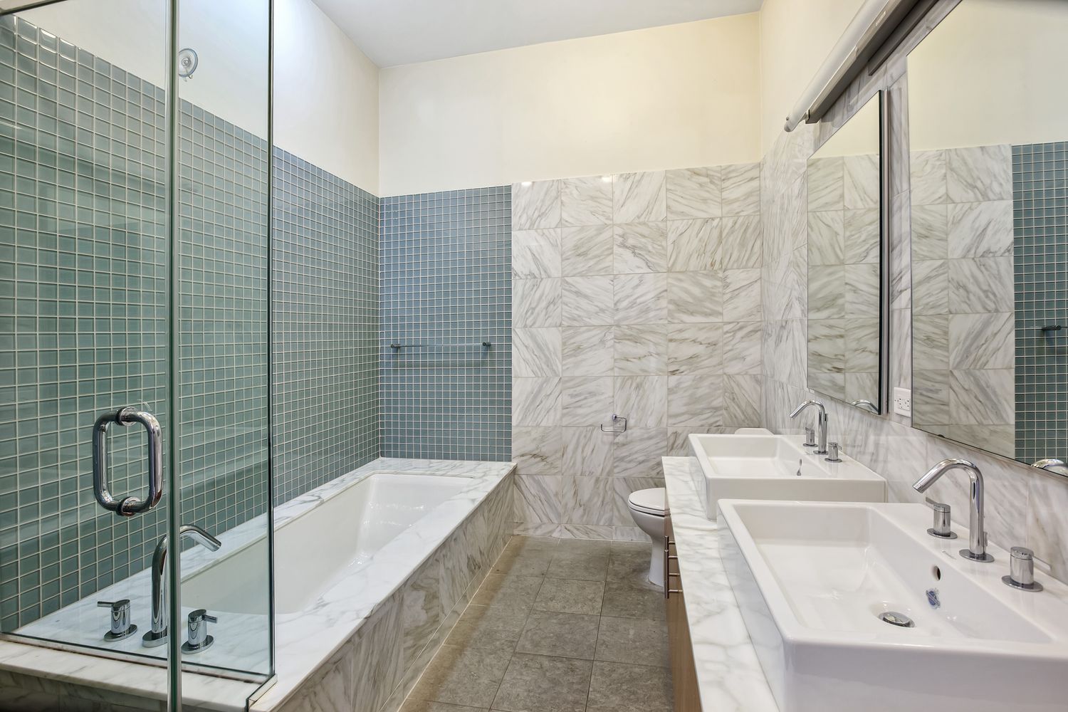 2056 5th Avenue, Unit 2B Manhattan, NY 10035 - Photo 6 of 13 a bathroom with a sink and mirror