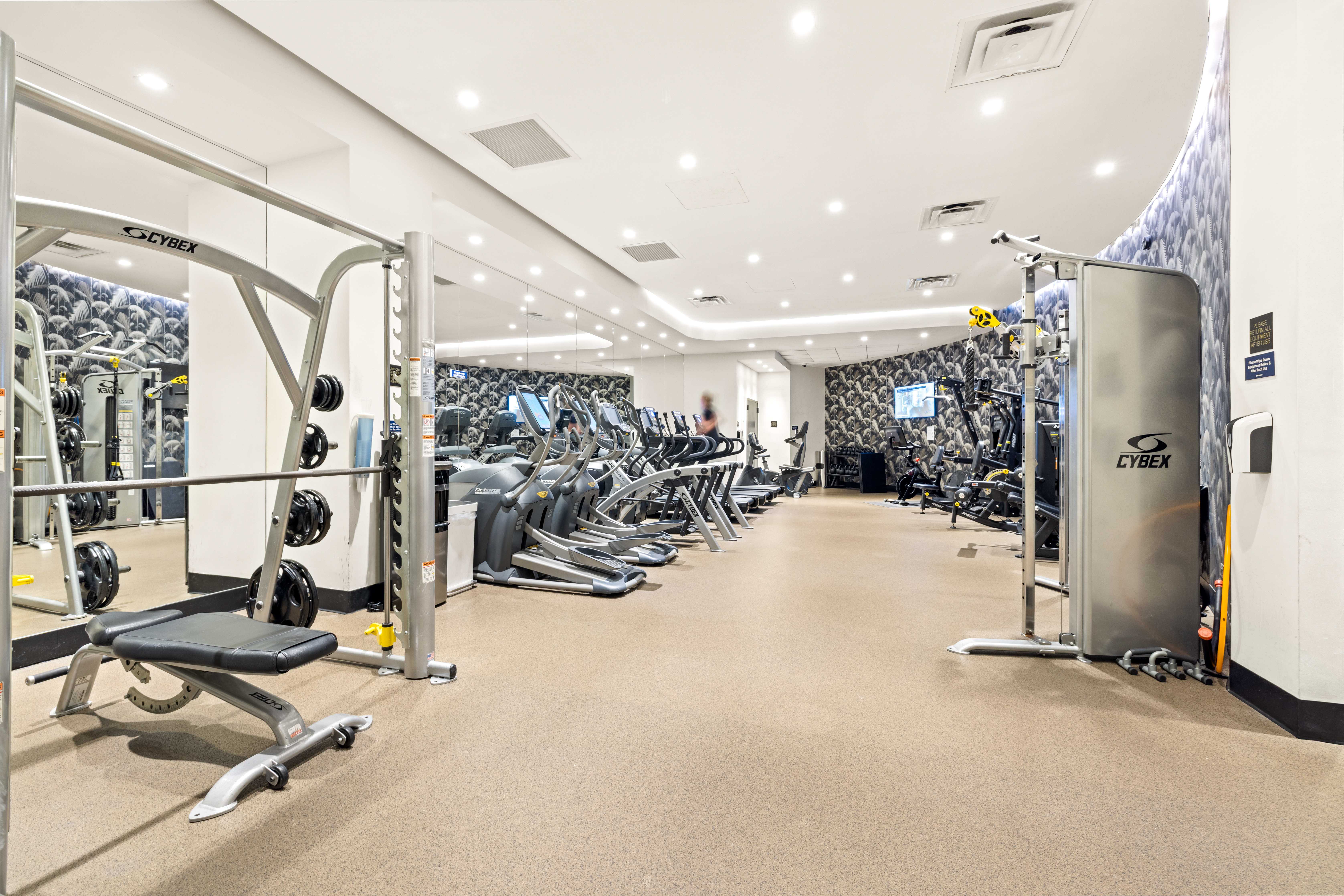 12 East 86th Street, Unit 402 Manhattan, NY 10028 - Photo 5 of 10 a view of a room with gym equipment