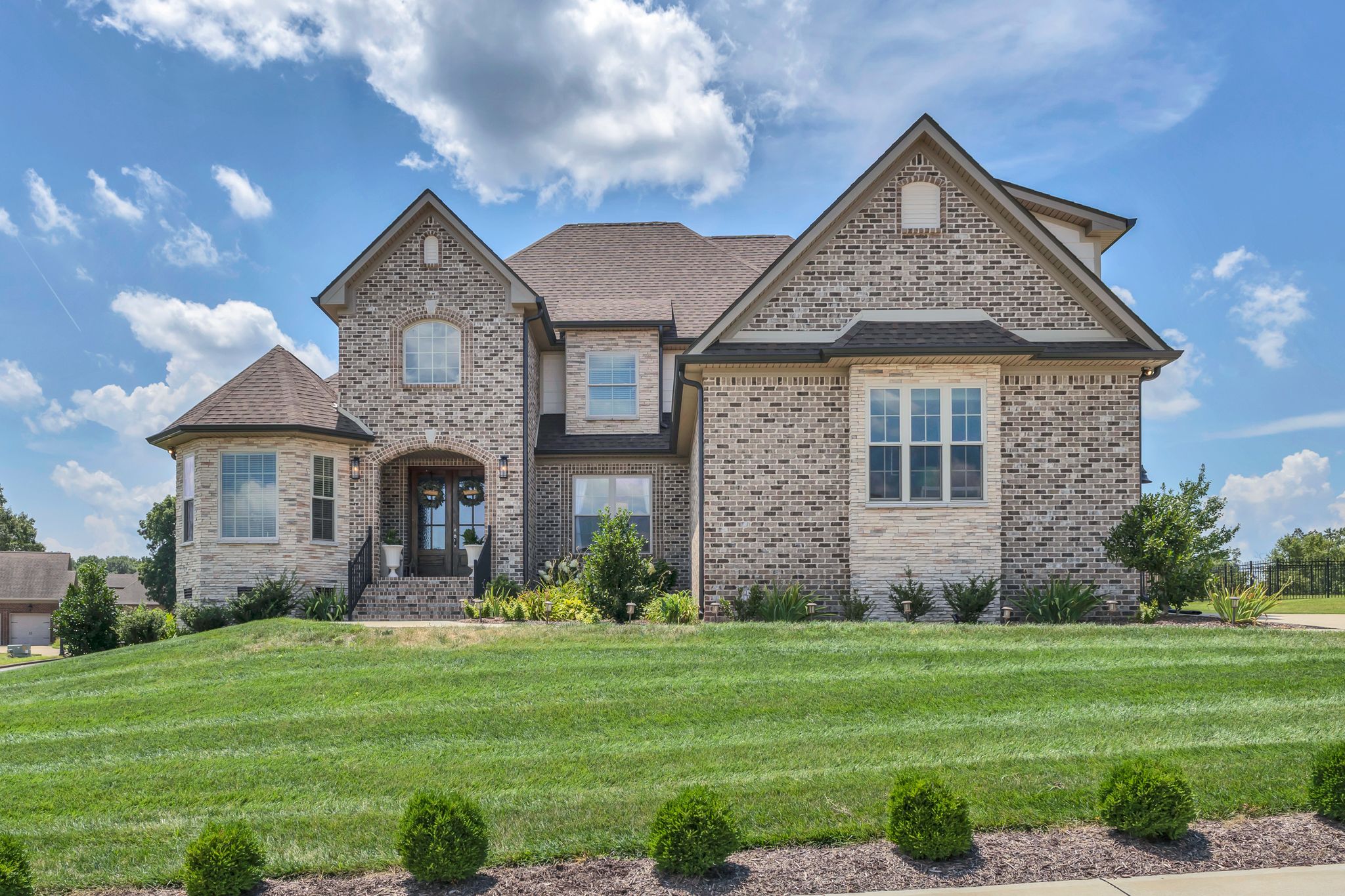 1484 Overlook Point Clarksville, TN 37043 - Photo 5 of 53 a front view of a house with a garden