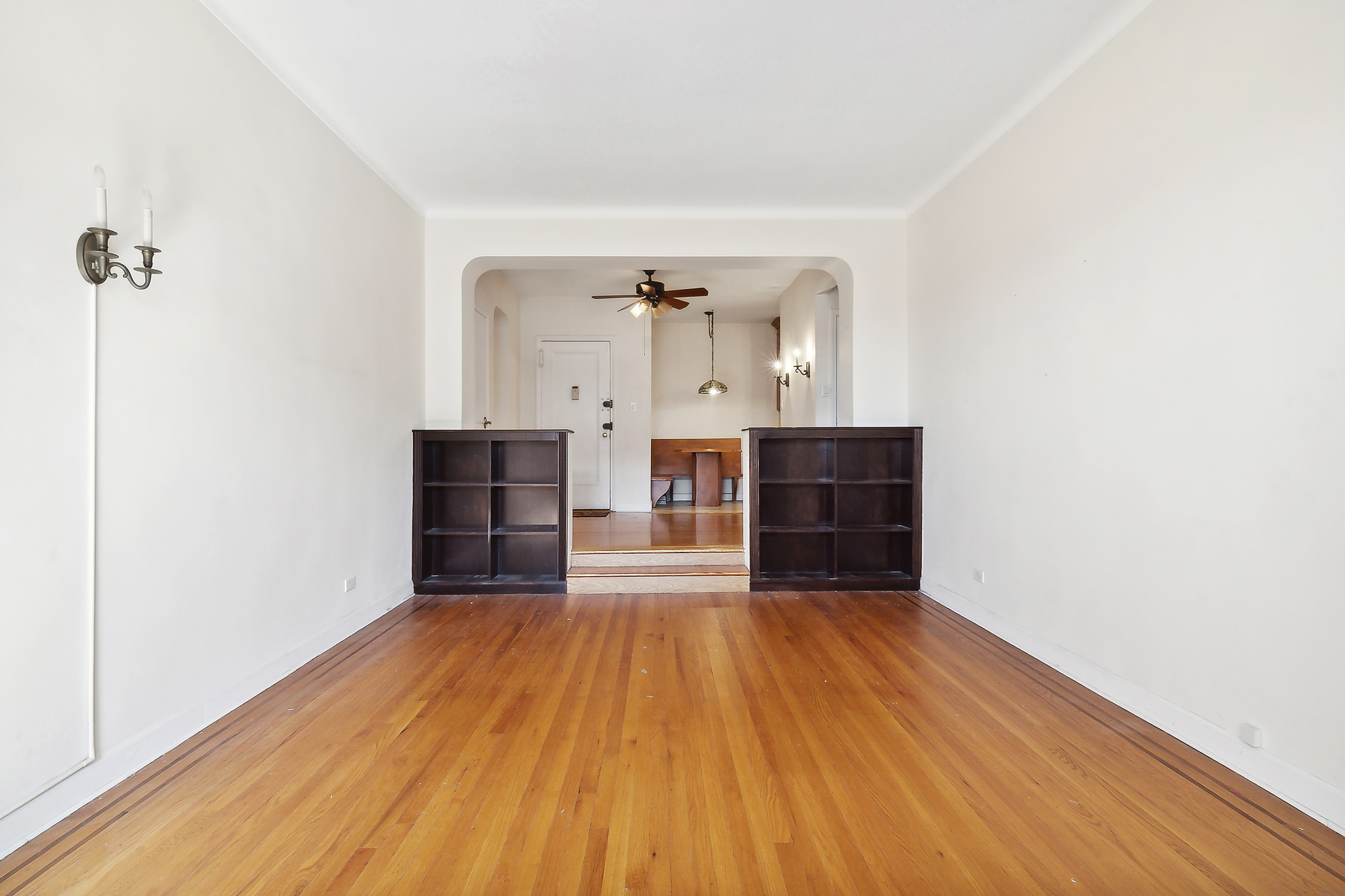 1615 Avenue I, Unit 603 Brooklyn, NY 11230 - Photo 4 of 13 a view of a room with wooden floor