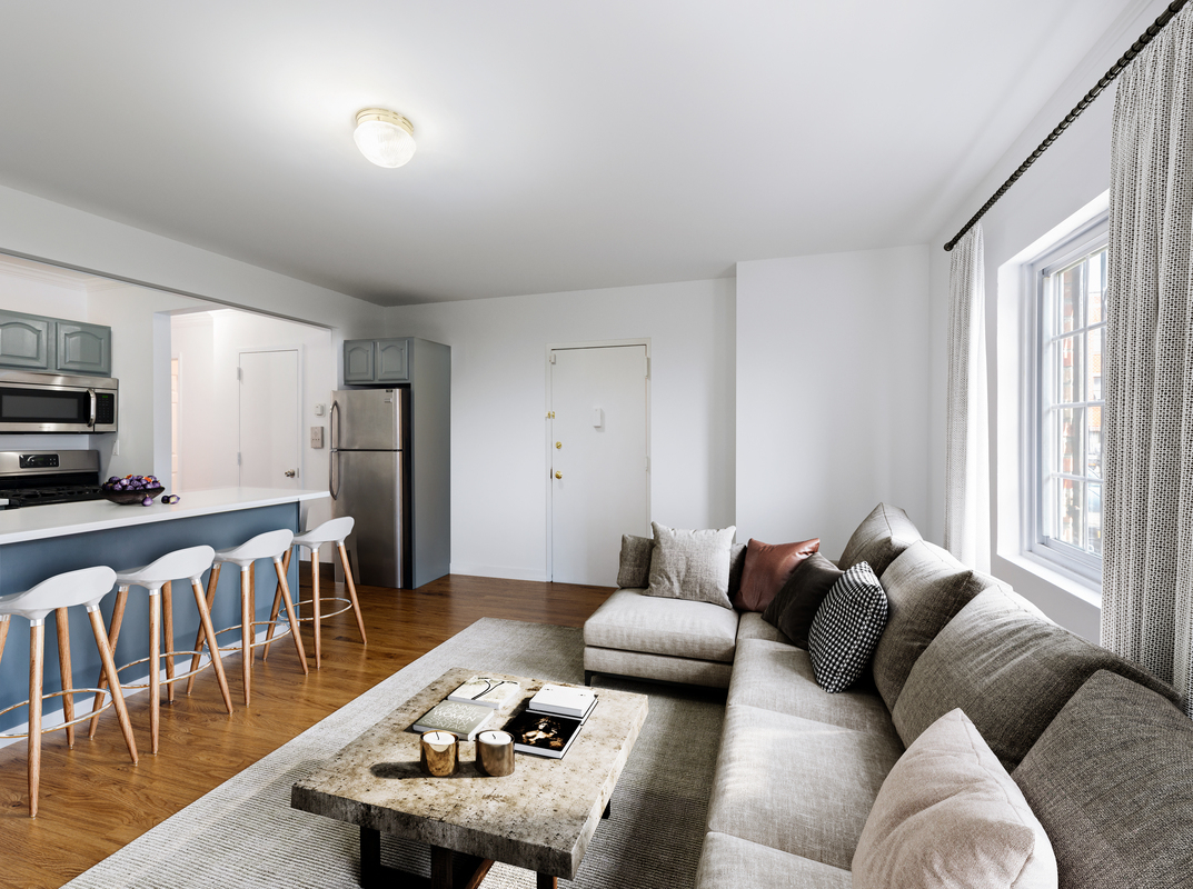 54 Lott Street, Unit 2 Brooklyn, NY 11226 - Photo 2 of 9 a living room with furniture and wooden floor