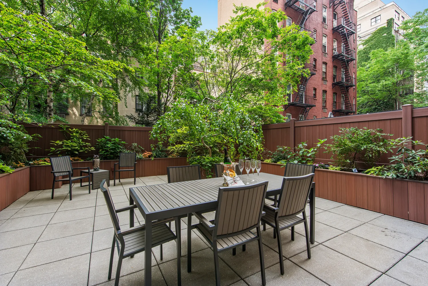 a view of a tables and chairs in the patio