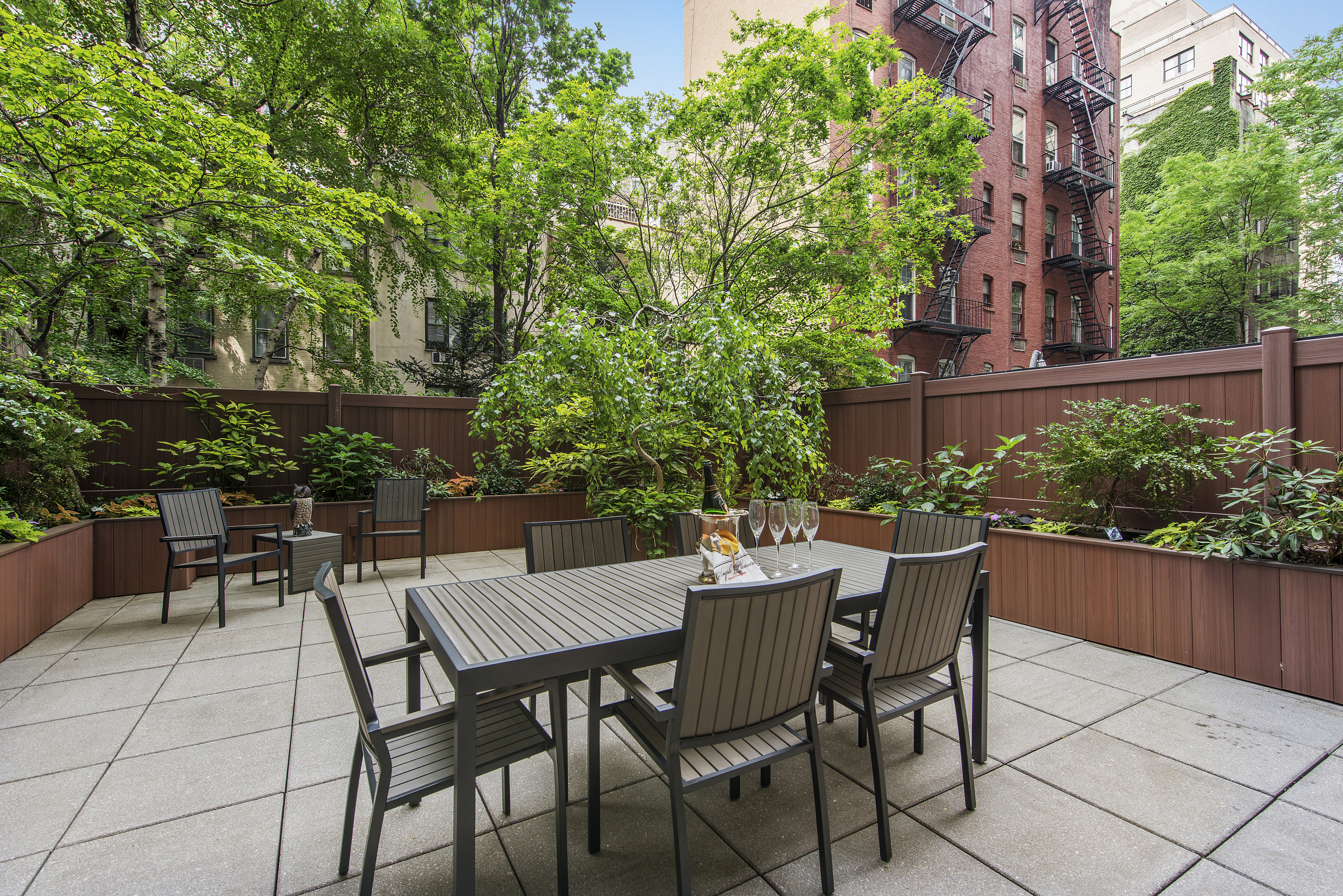 a view of a tables and chairs in the patio