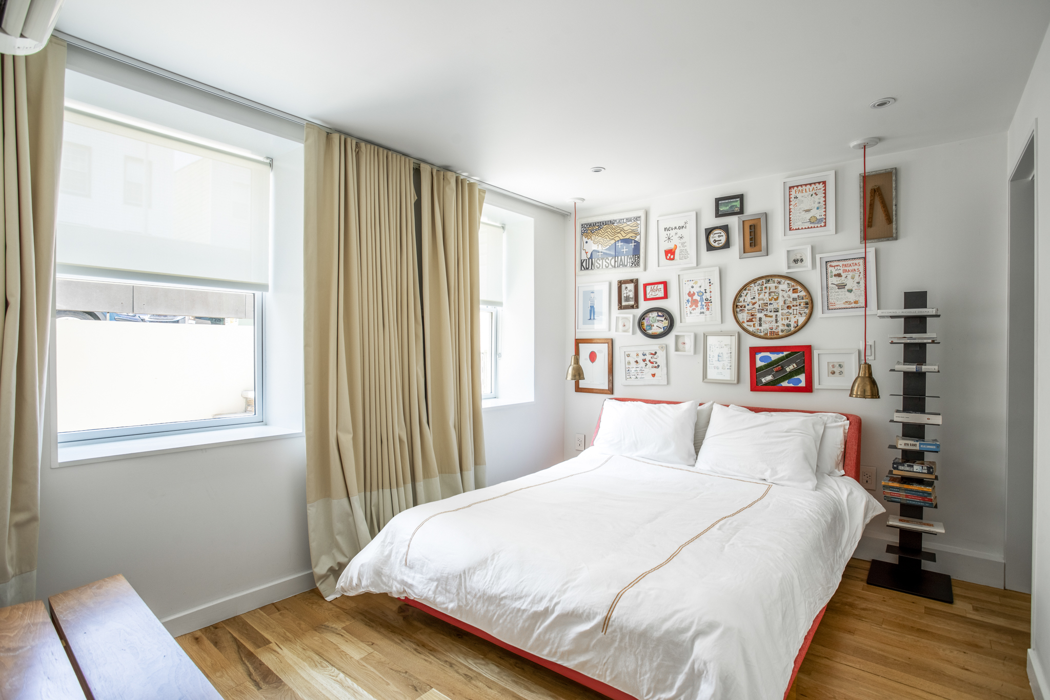 512 Lorimer Street Brooklyn, NY 11211 - Photo 21 of 22 a bedroom with bed and a window