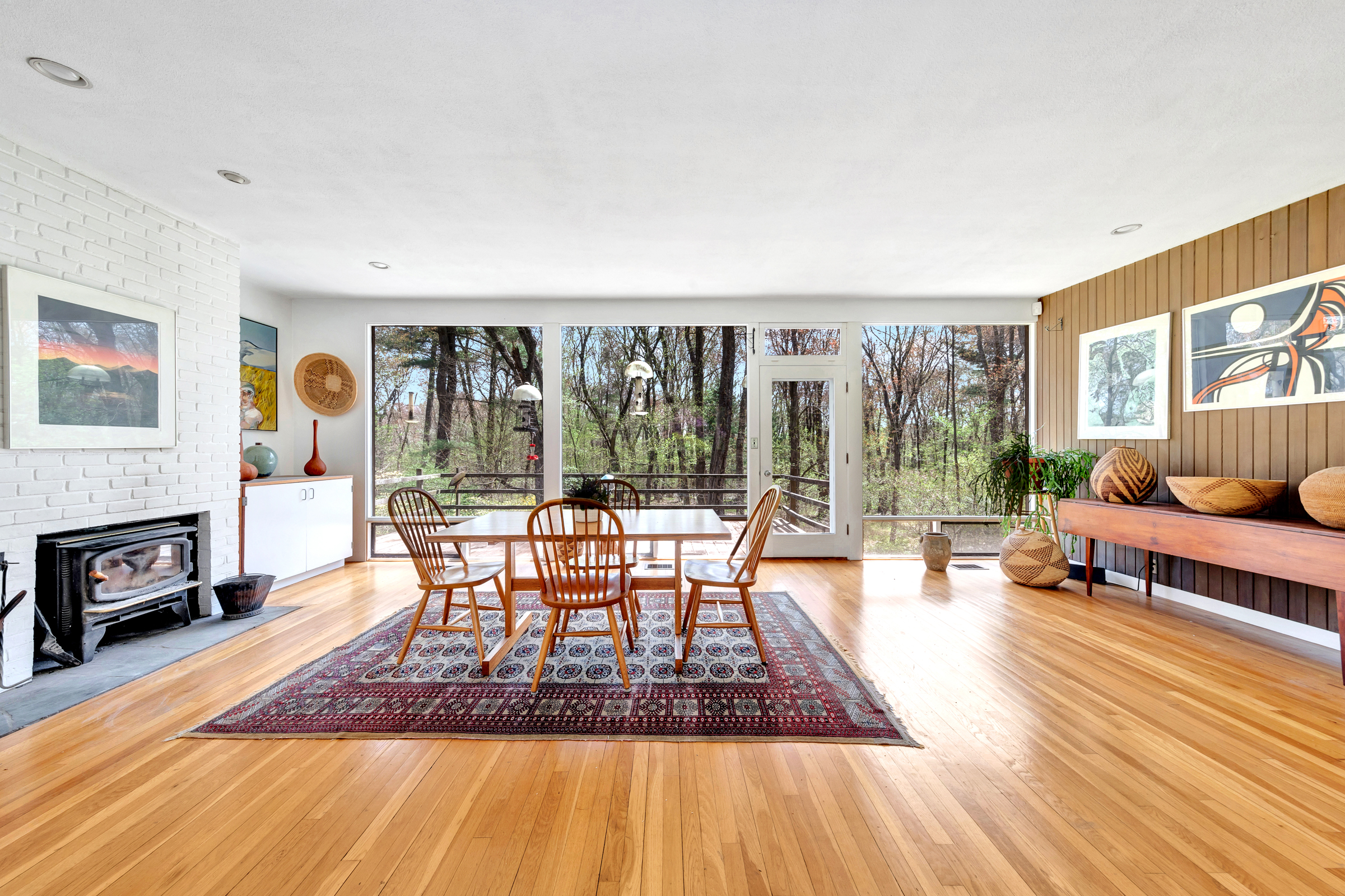14 Barberry Road Lexington, MA 02421 - Photo 5 of 30 a living room with furniture a fireplace and a floor to ceiling window