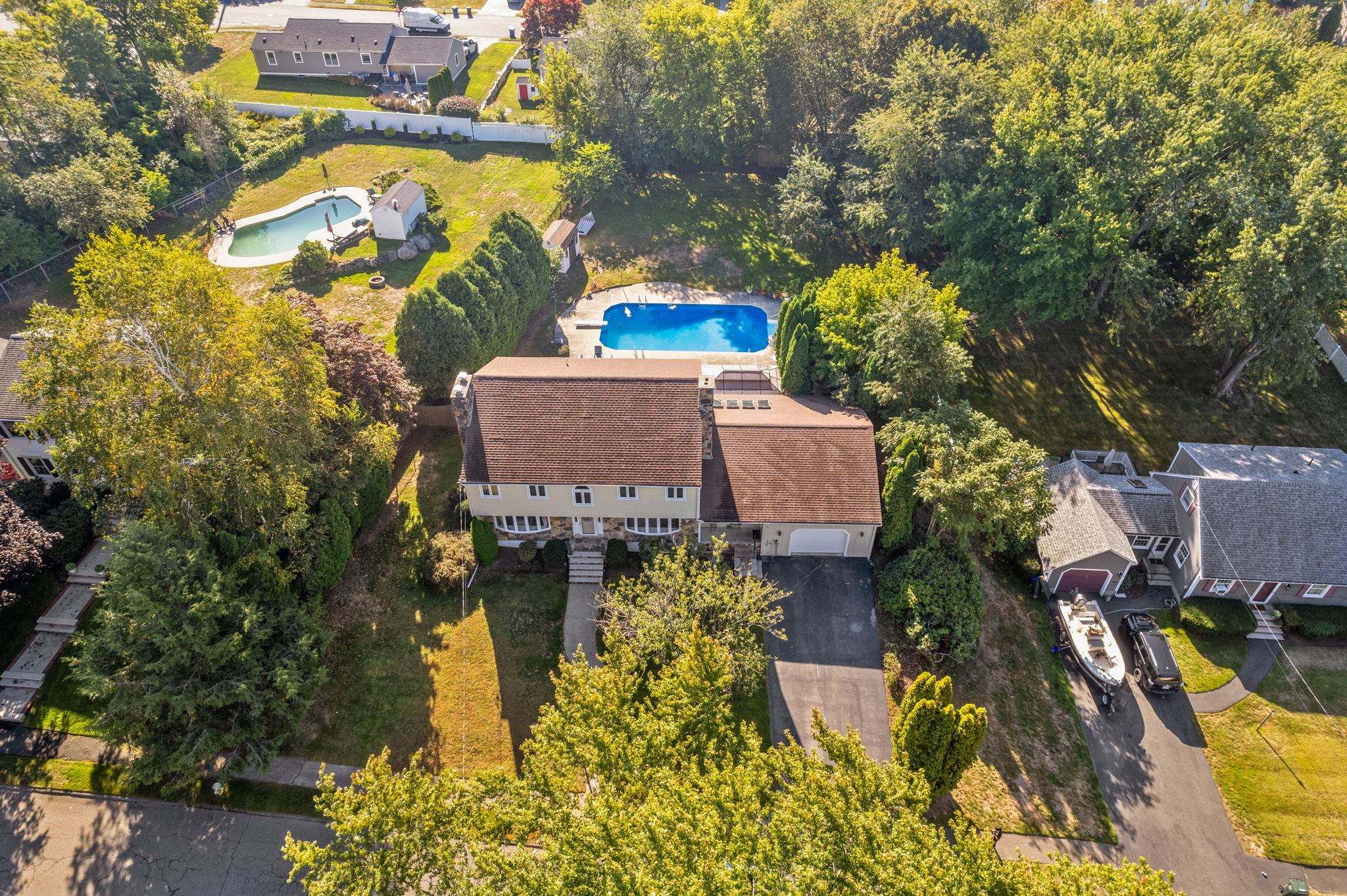 11 Ardmore Drive Danvers, MA 01923 - Photo 7 of 18 an aerial view of a house with swimming pool and large trees