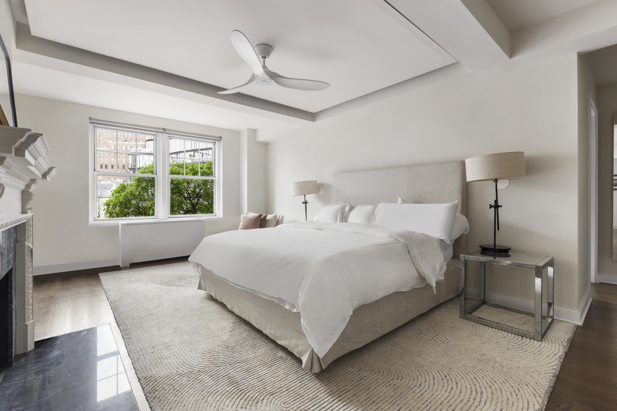 2 Horatio Street, Unit 4JS Manhattan, NY 10014 - Photo 13 of 20 a bedroom with a large bed and a window