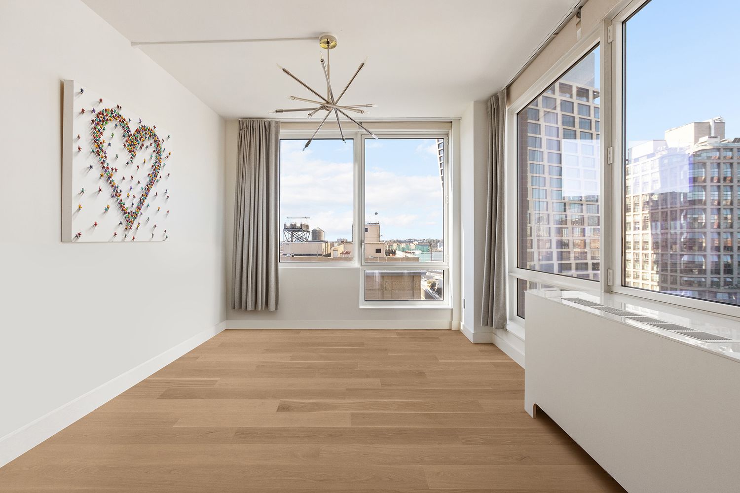 a view of a room with a large window