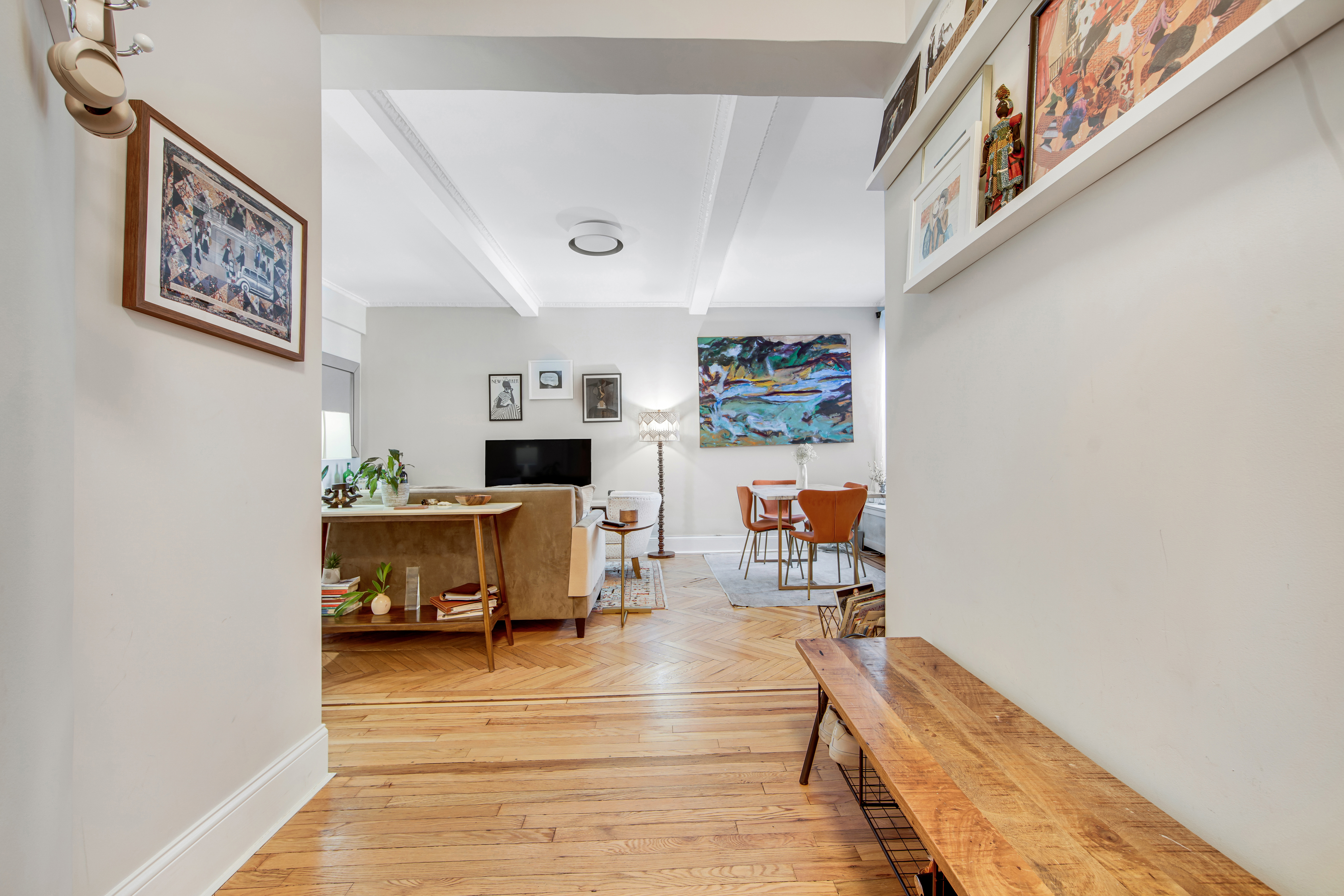 165 West 91st Street, Unit 15B Manhattan, NY 10024 - Photo 15 of 24 a living room with furniture and a table