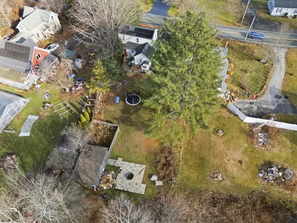 an aerial view of residential house with outdoor space