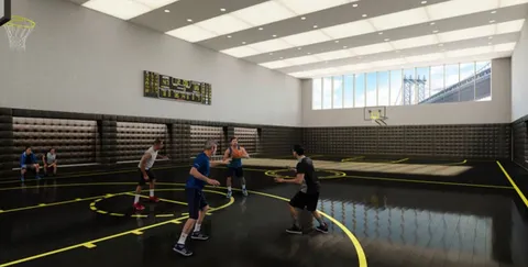 a living room with furniture kitchen view and a chandelier