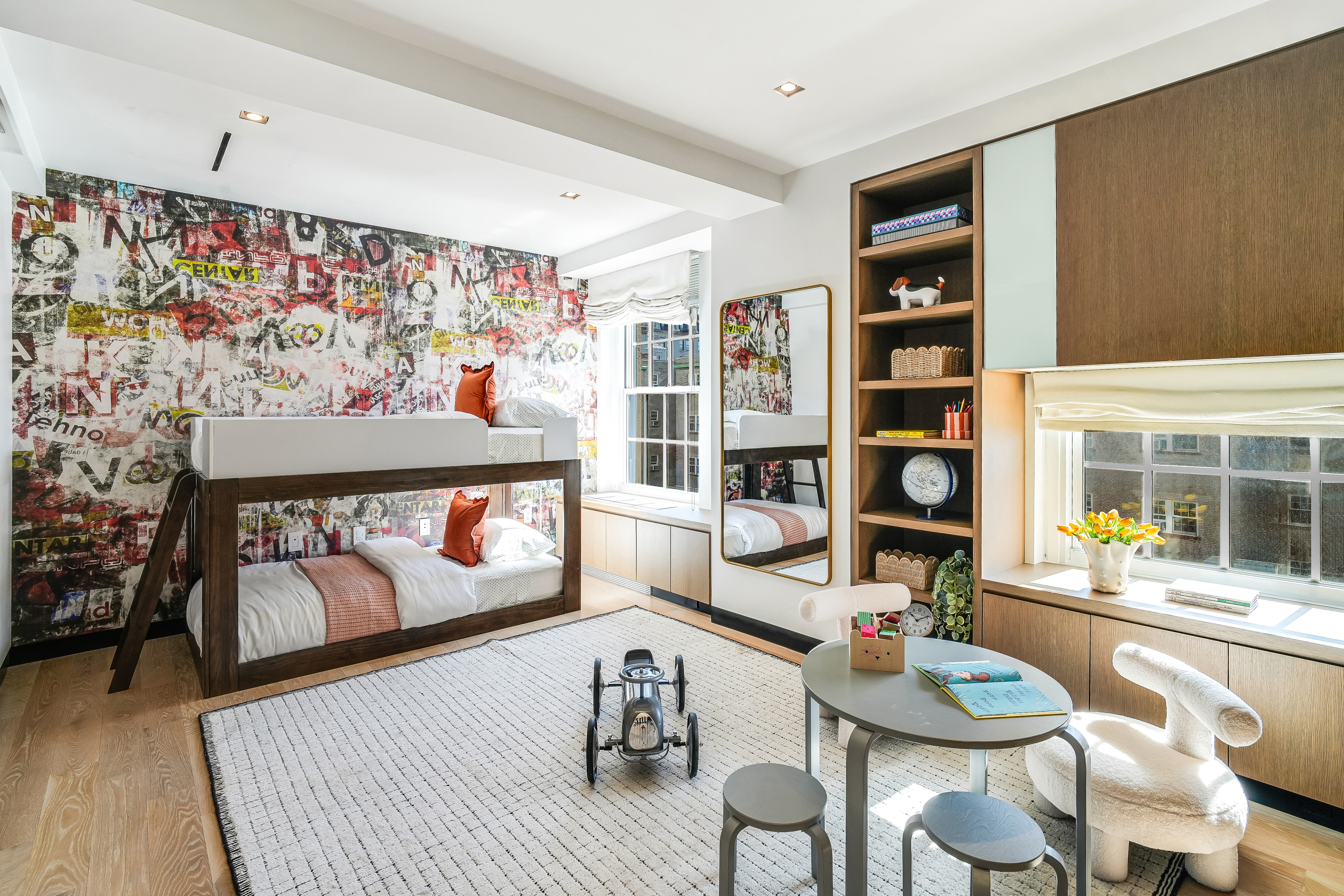 1 5th Avenue, Unit 5GH Manhattan, NY 10003 - Photo 19 of 26 a living room with furniture and a table