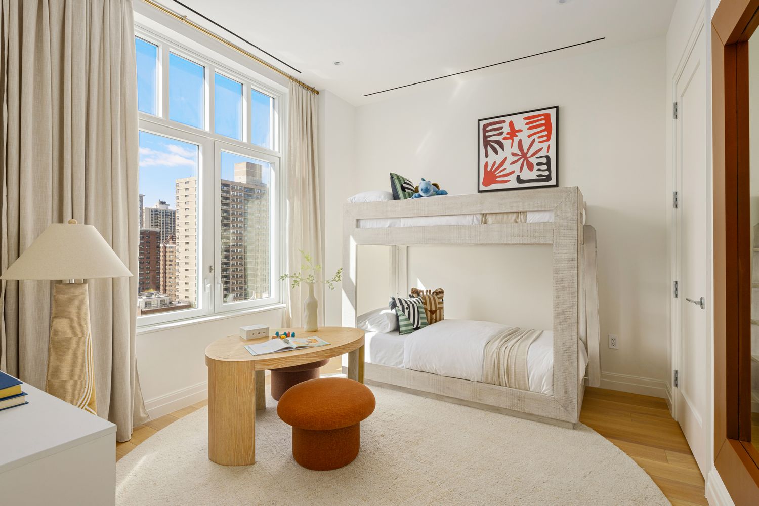 15 West 96th Street, Unit 19 Manhattan, NY 10025 - Photo 9 of 17 a bedroom with furniture and a window