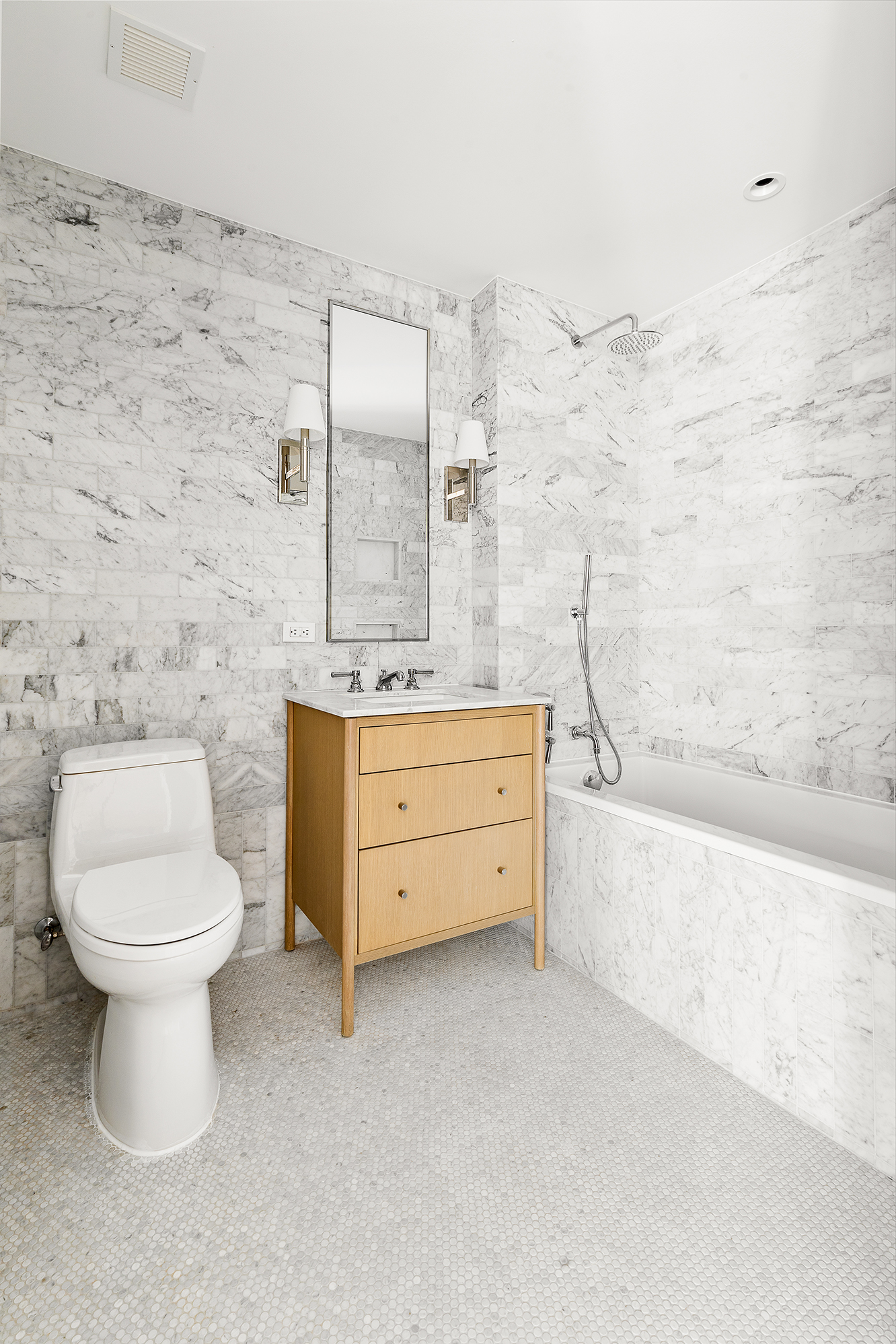 300 West 122nd Street, Unit 12C Manhattan, NY 10027 - Photo 6 of 11 a bathroom with a sink a toilet and bathtub