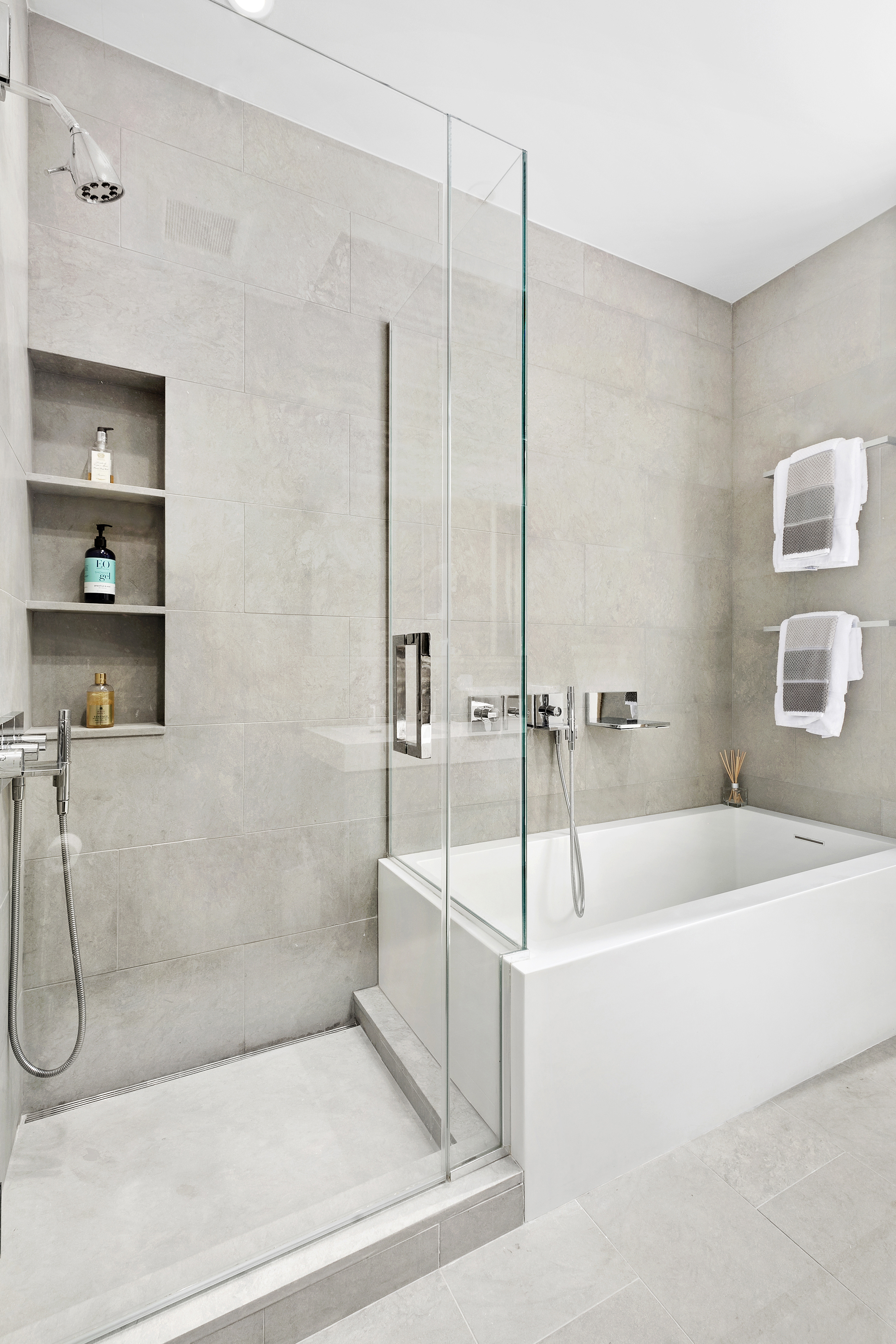 88 Lexington Avenue, Unit 802 Manhattan, NY 10016 - Photo 7 of 22 a bathroom with a sink and a shower