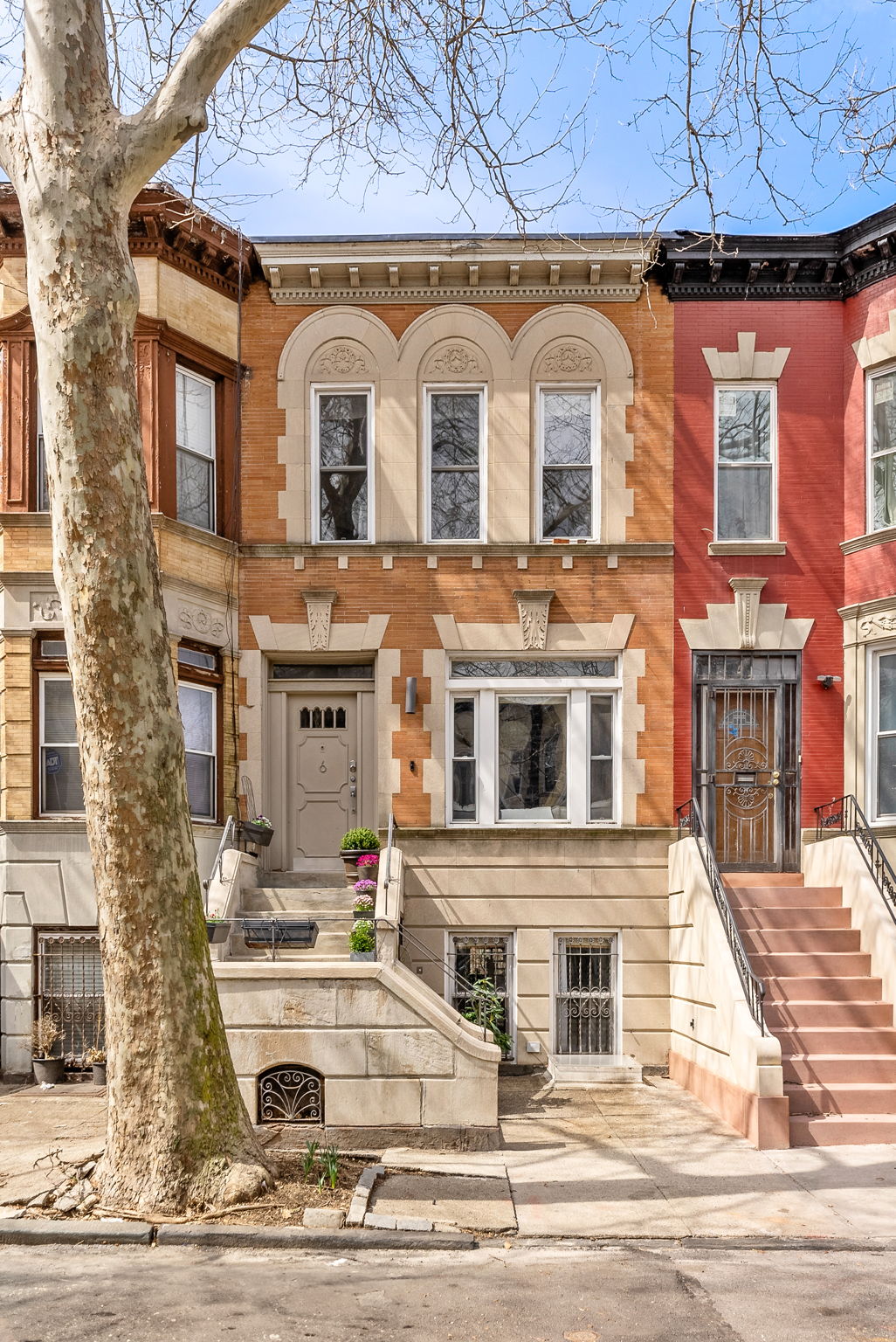 6 Virginia Place Brooklyn, NY 11213 - Photo 25 of 26 a front view of a house with a yard