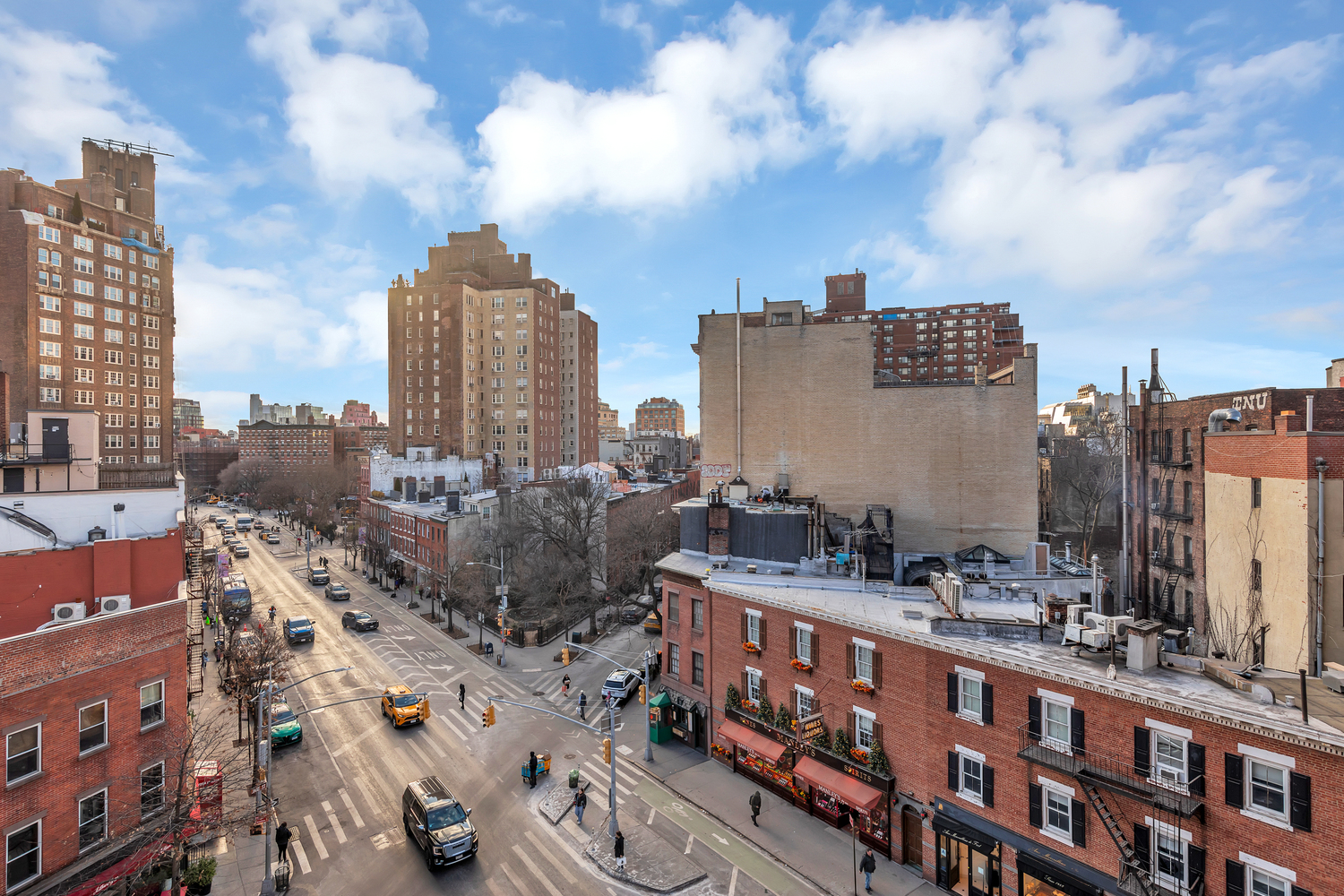 31 Jane Street, Unit 7A Manhattan, NY 10014 - Photo 6 of 11 a city view with tall buildings