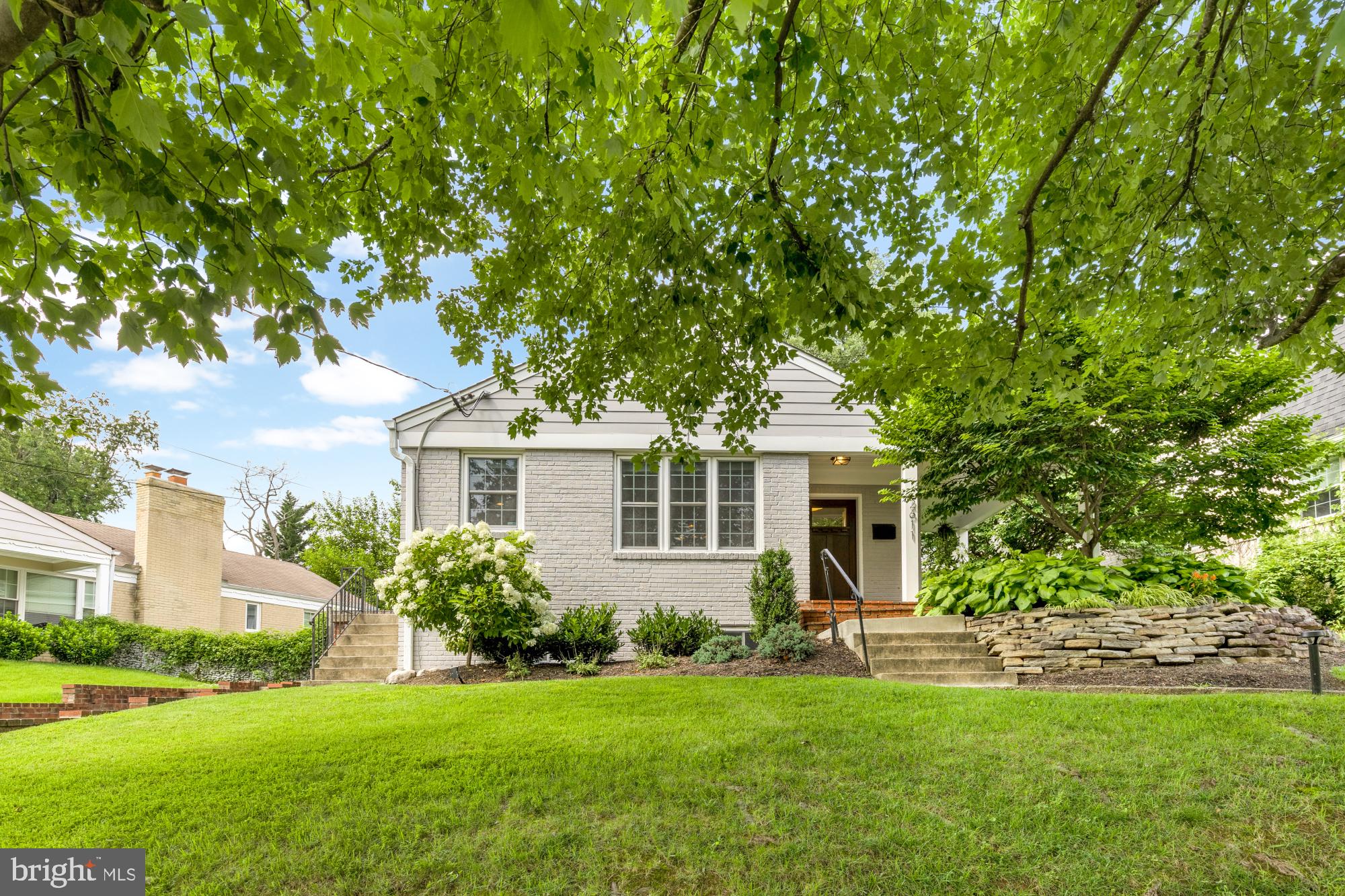 2611 Ross Road Chevy Chase, MD 20815 - Photo 2 of 37 a front view of house with yard and green space