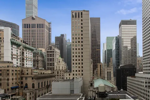 a view of a city with tall buildings