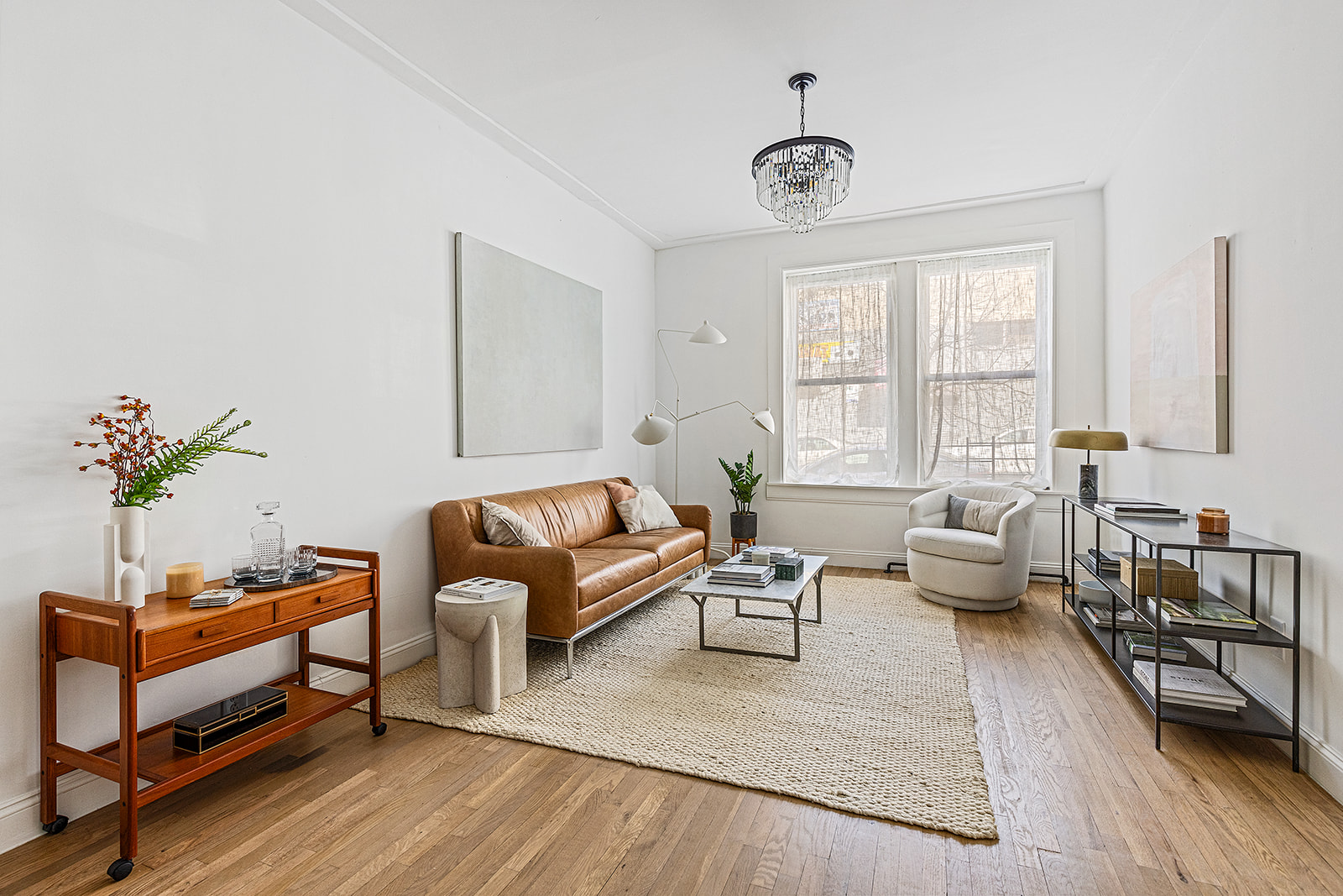 610 Marlborough Road Brooklyn, NY 11226 - Photo 2 of 16 a living room with furniture and a large window