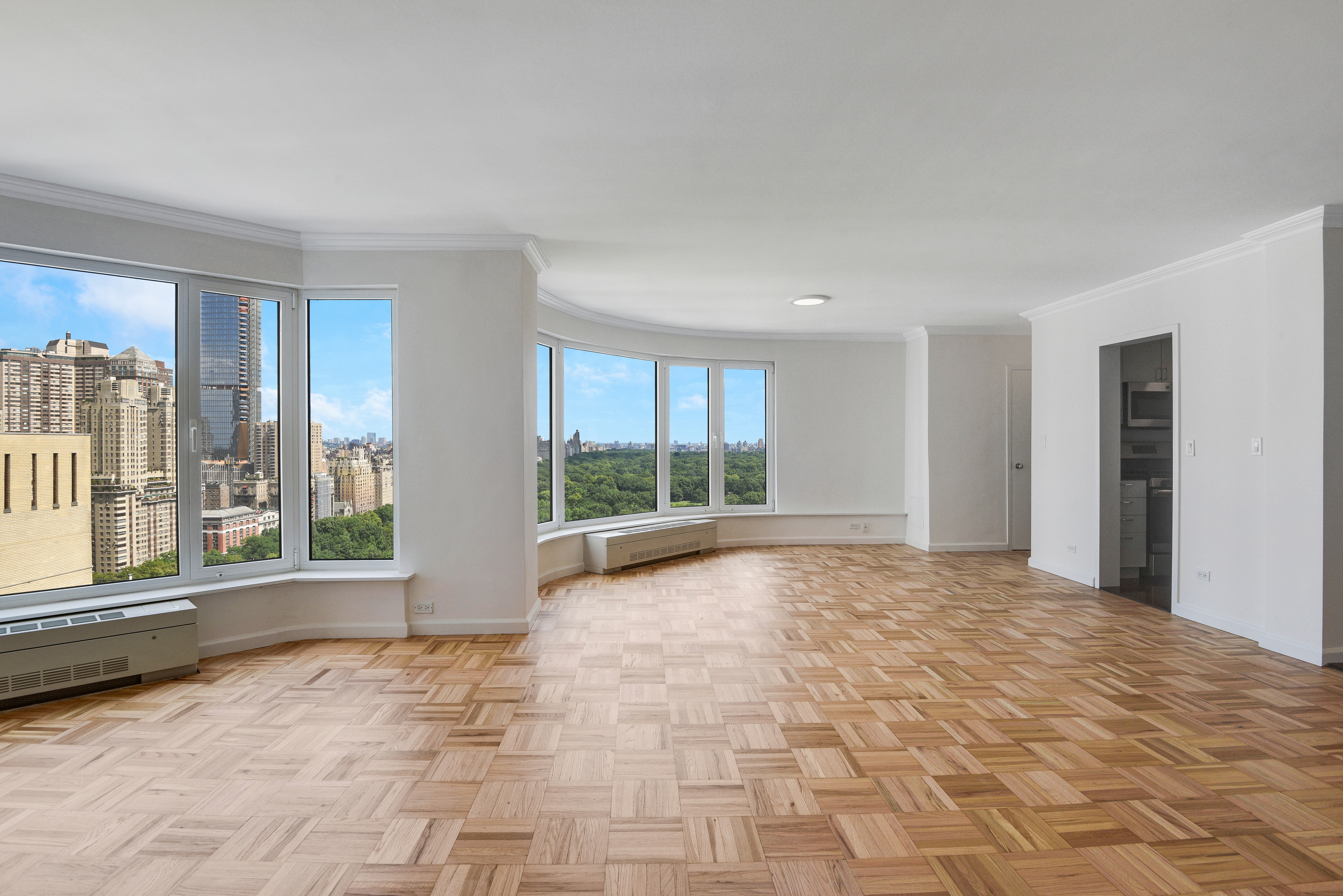 200 Central Park South, Unit 29C Manhattan, NY 10019 - Photo 3 of 23 a view of an empty room with a window