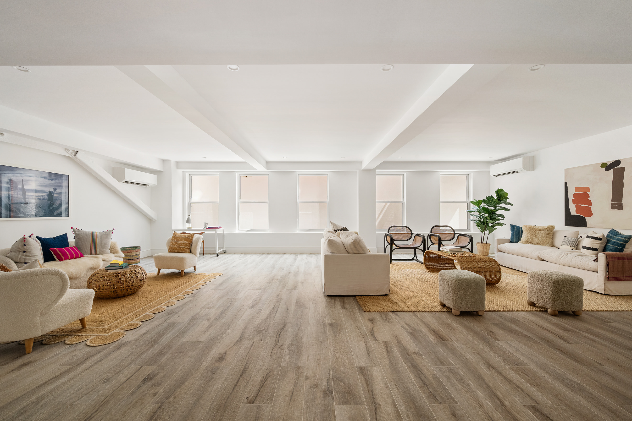 524 Halsey Street, Unit 109 Brooklyn, NY 11233 - Photo 7 of 10 a living room with furniture and a wooden floor
