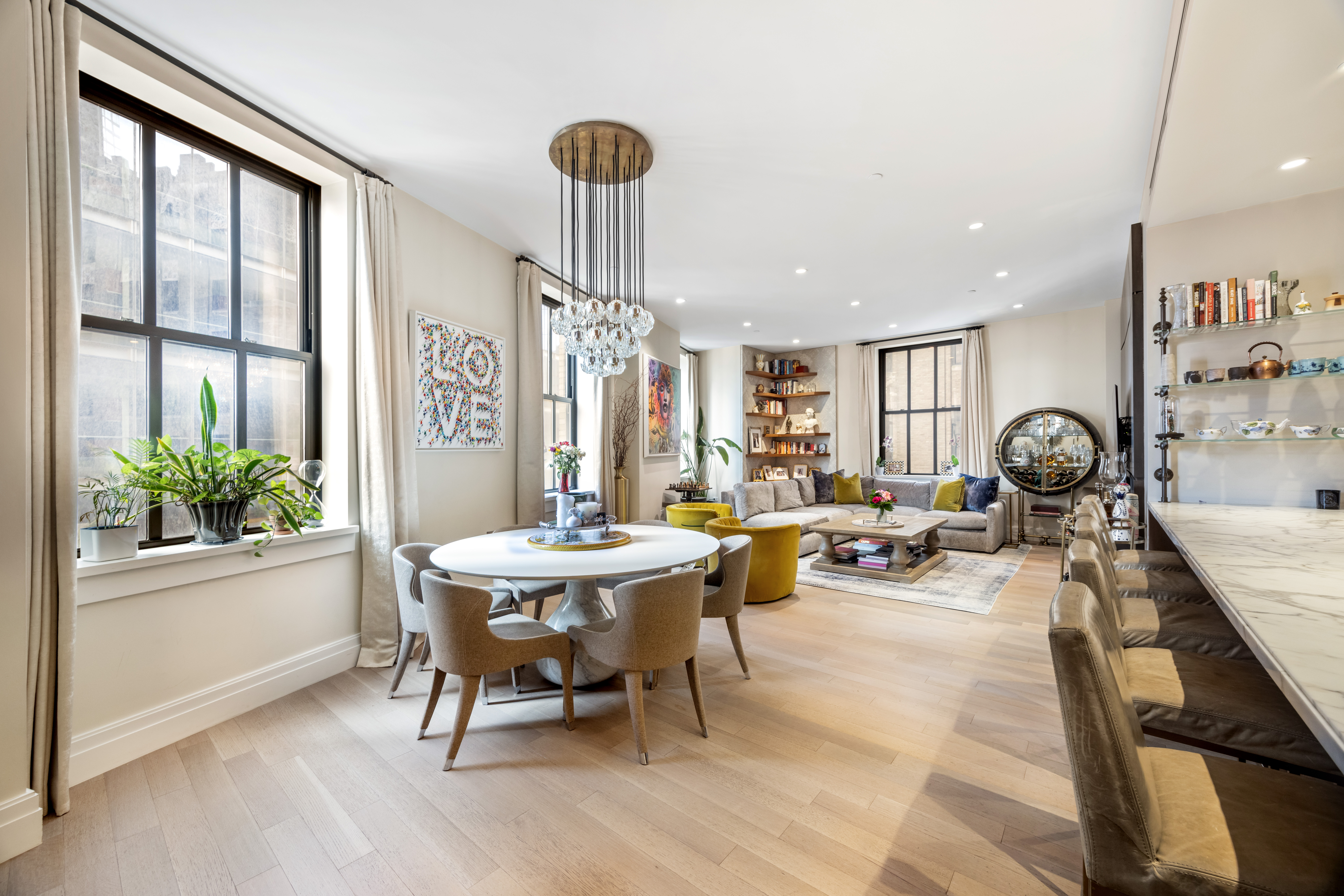 a view of a dining room with furniture window and outside view