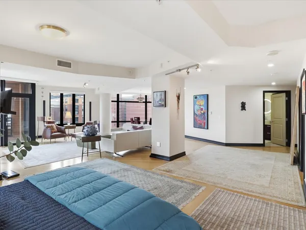 a living room with furniture and a table