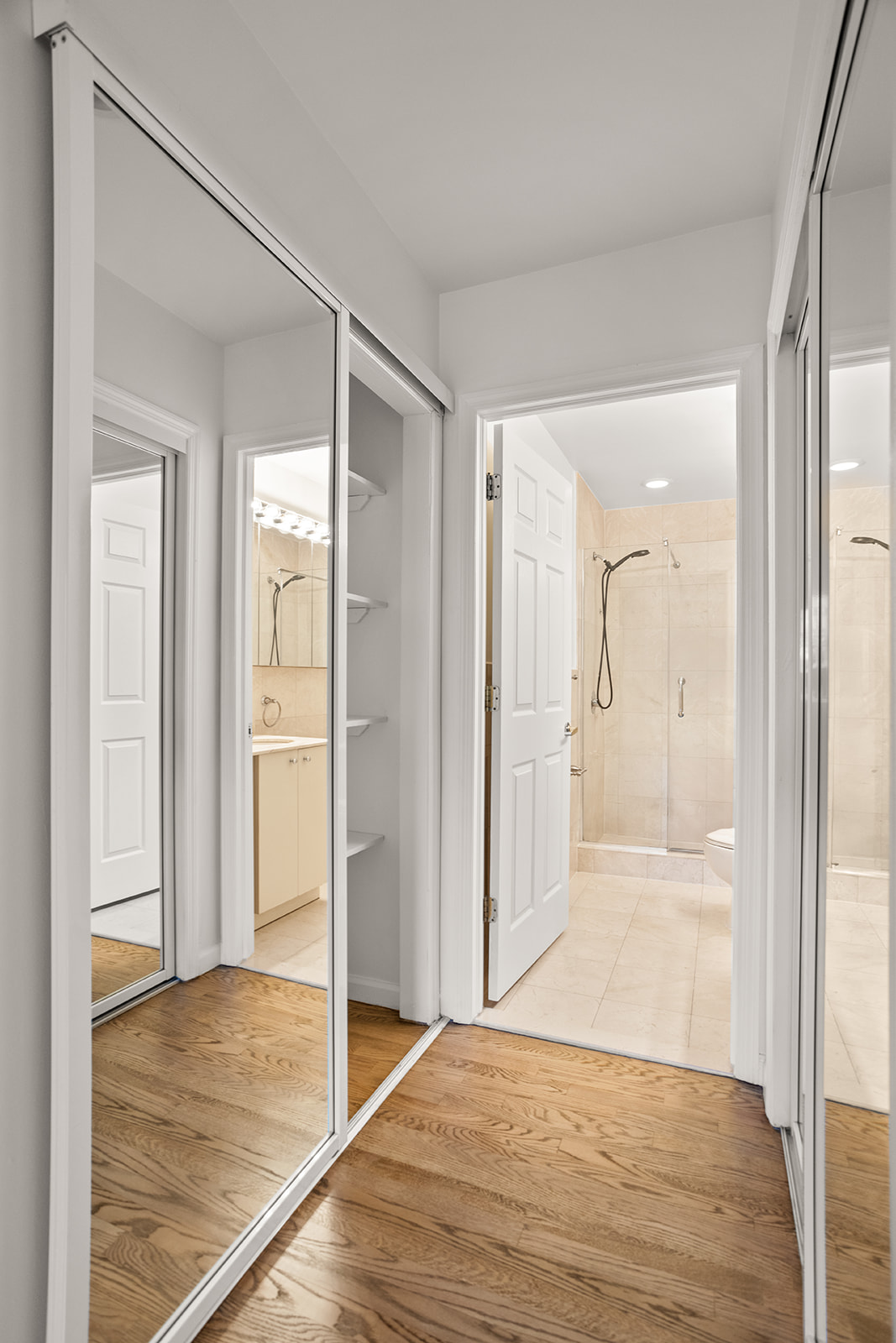 702 Ocean Parkway, Unit 5R Brooklyn, NY 11230 - Photo 8 of 13 a view of a bathroom with a glass shower door