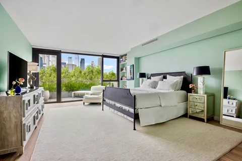 a view of a balcony with chair and table
