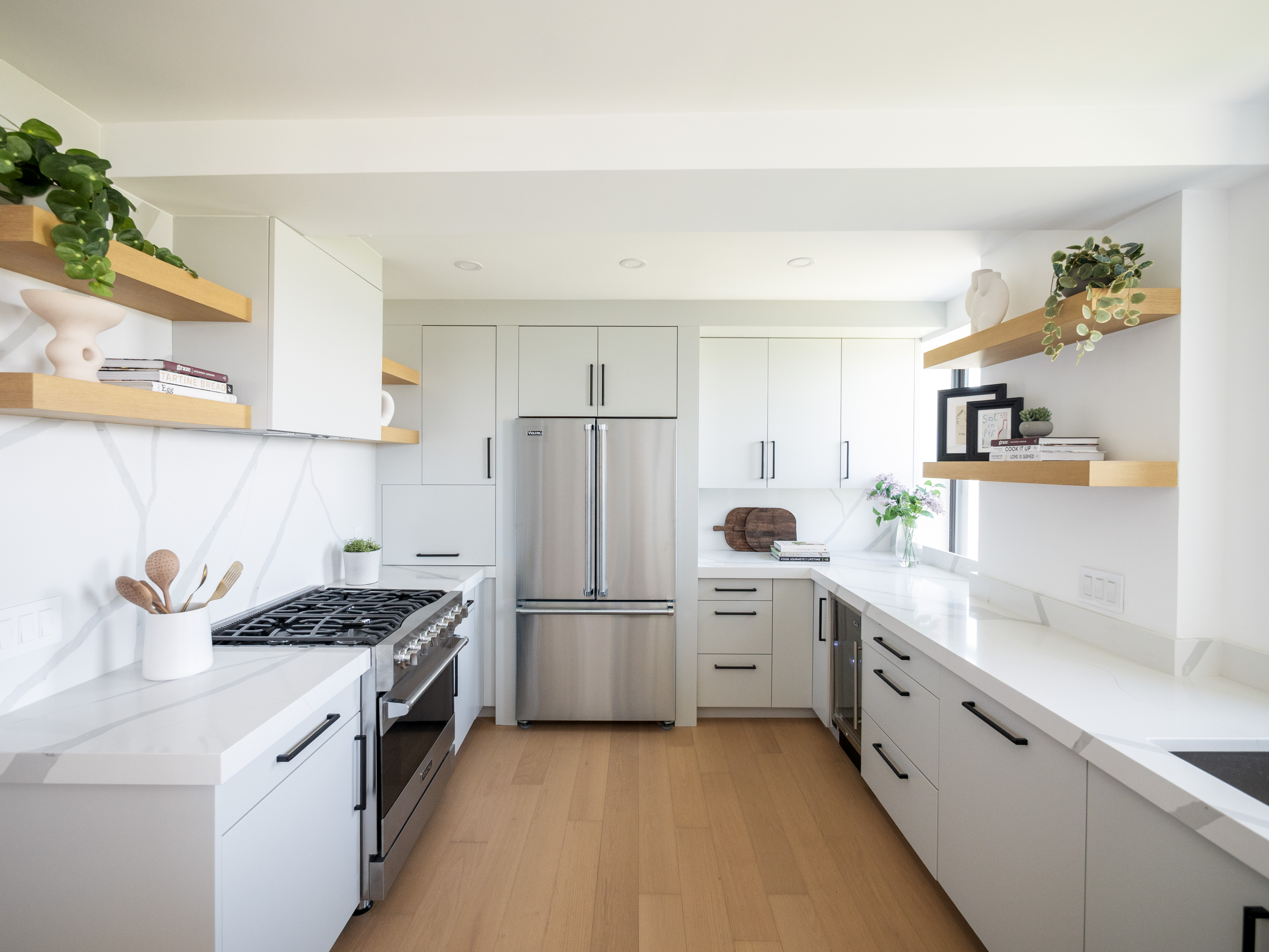 230 Riverside Drive, Unit 14AC Manhattan, NY 10025 - Photo 9 of 30 a kitchen with stainless steel appliances a stove a sink and a refrigerator