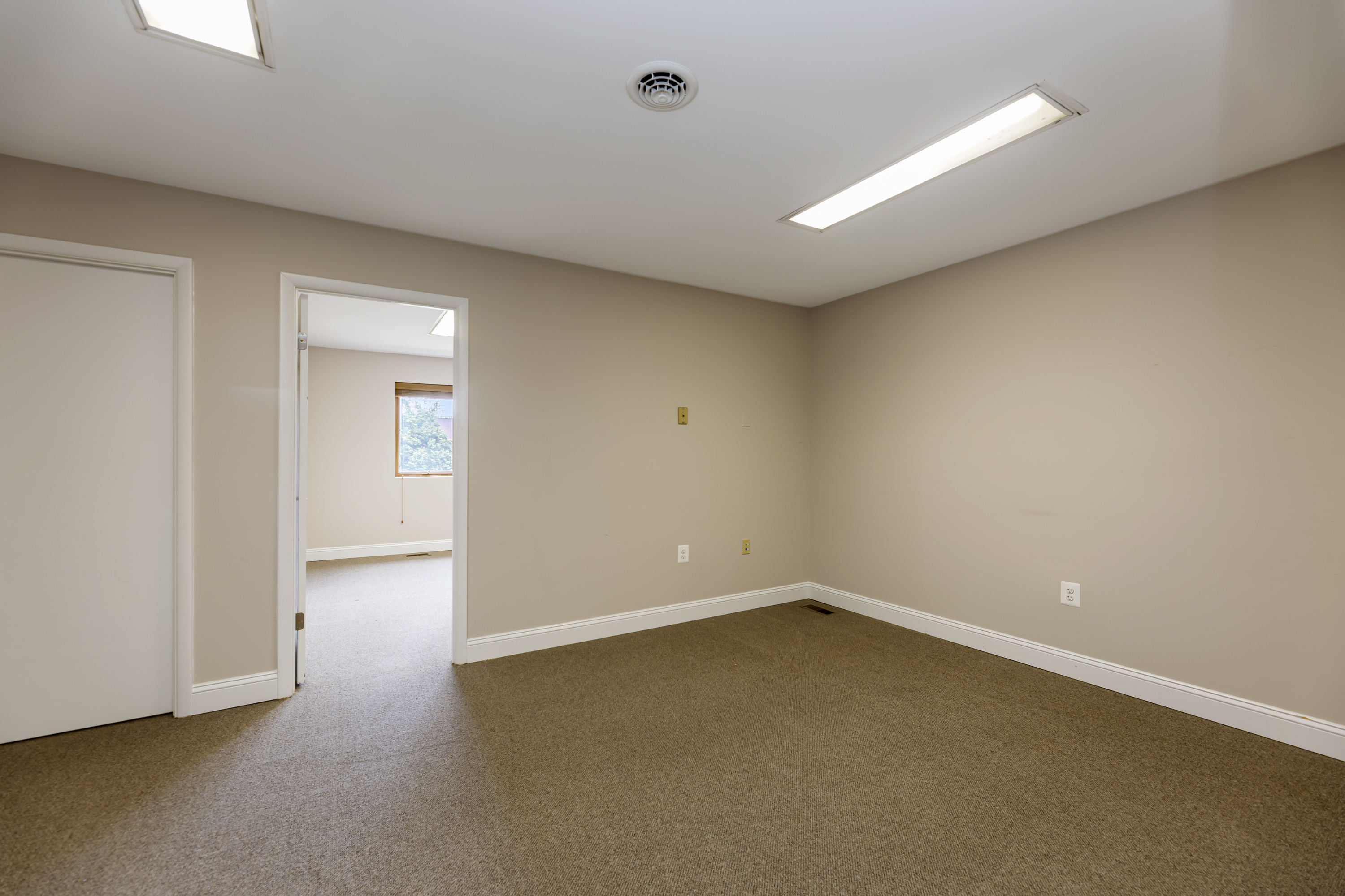 5885 Allentown Road Suitland, MD 20746 - Photo 19 of 23 an empty room with a empty space and windows