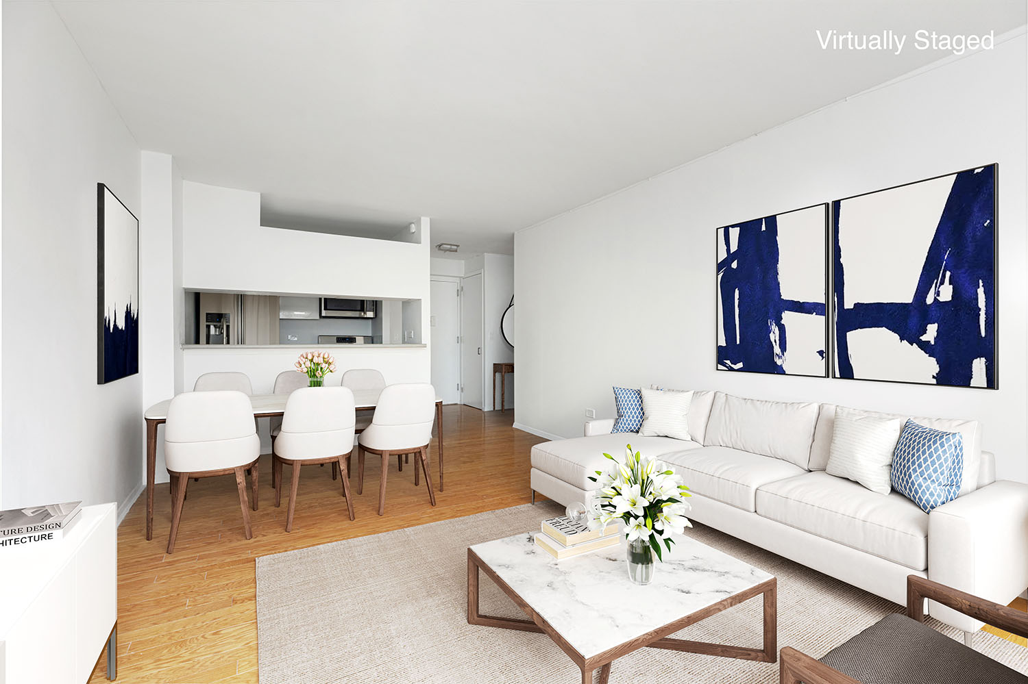 2 South End Avenue, Unit 8E Manhattan, NY 10280 - Photo 3 of 16 a living room with couches and a dining table with kitchen view