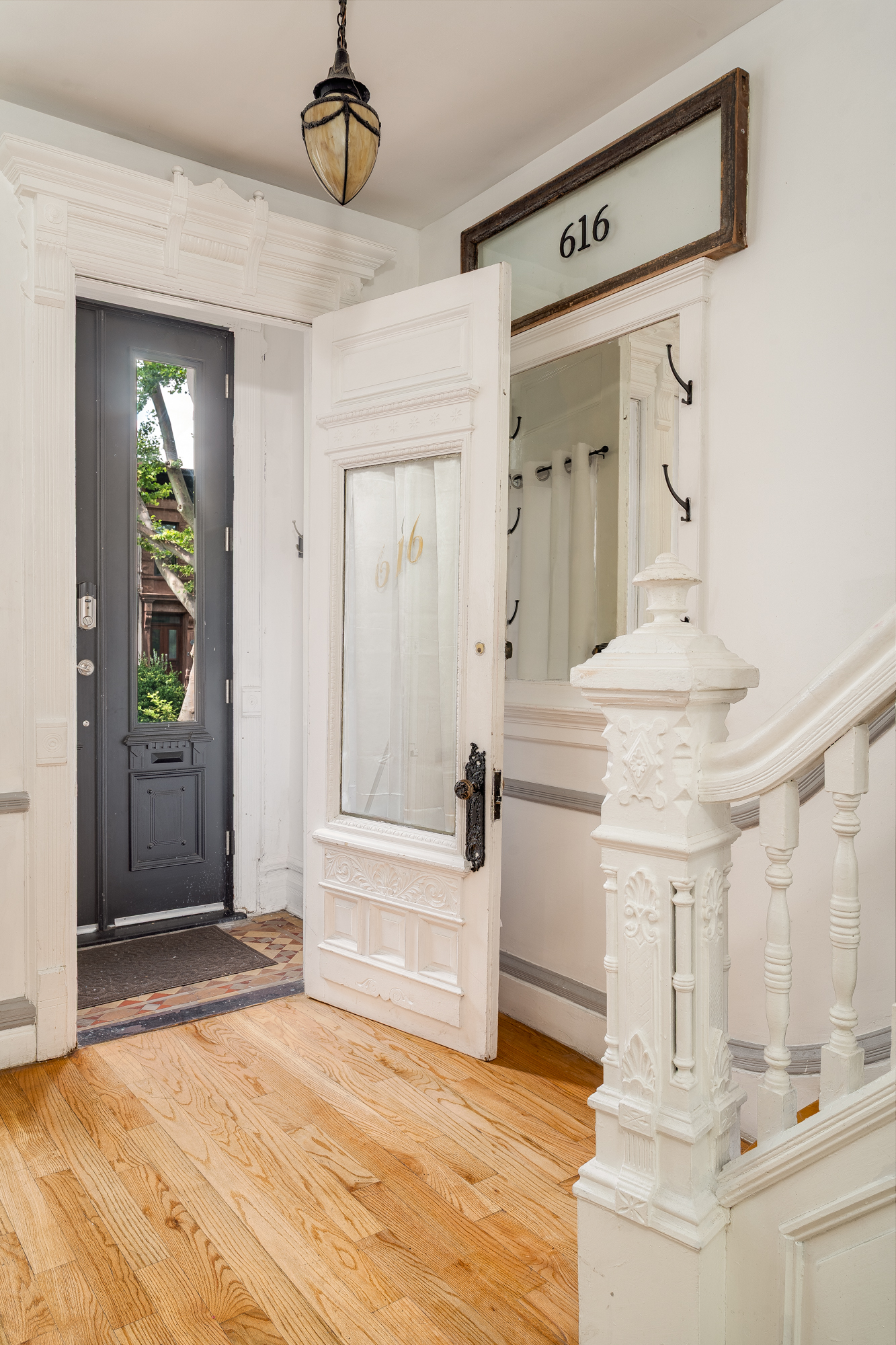 616 MacDonough Street, Unit 2 Brooklyn, NY 11233 - Photo 10 of 12 a view of a hallway with front door