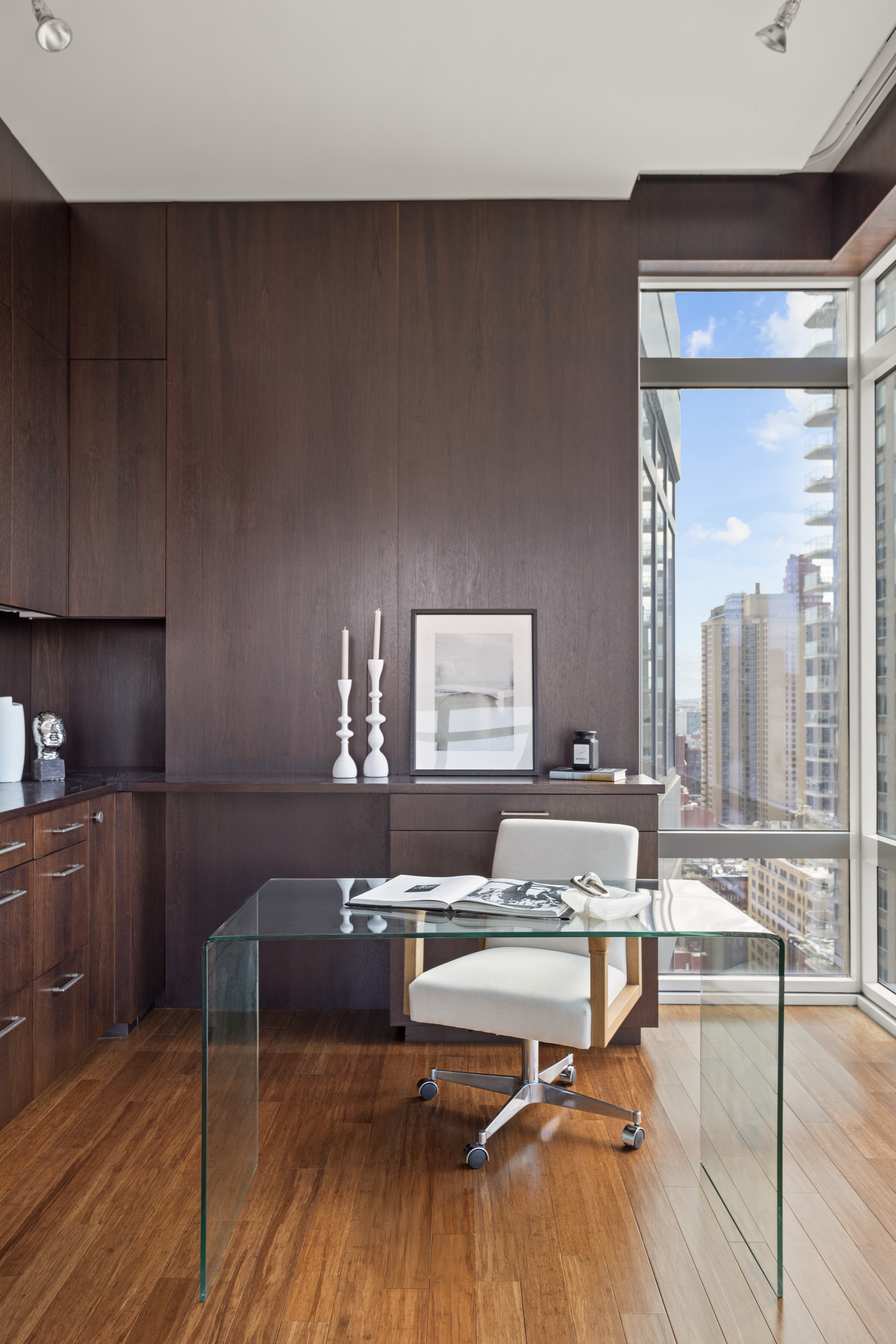 255 East 74th Street, Unit 21B Manhattan, NY 10021 - Photo 12 of 40 a living room with furniture and wooden floor