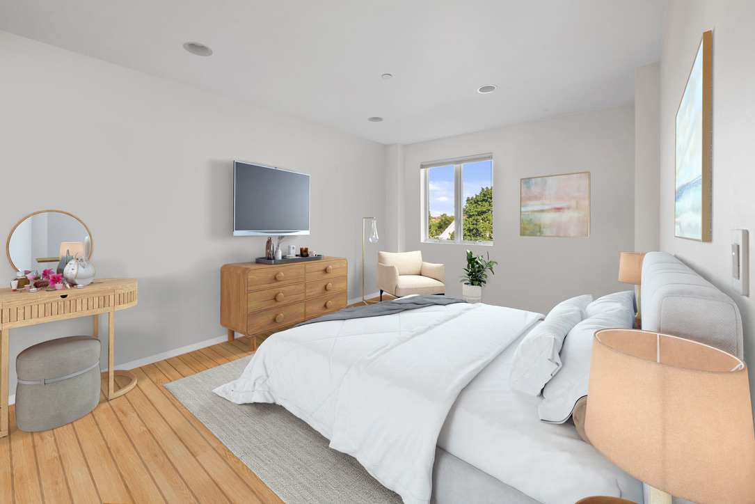 702 Ocean Parkway, Unit 5A Brooklyn, NY 11230 - Photo 2 of 9 a bedroom with a bed and wooden floor