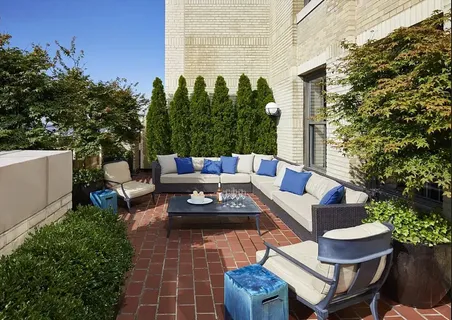 a building outdoor space with patio furniture