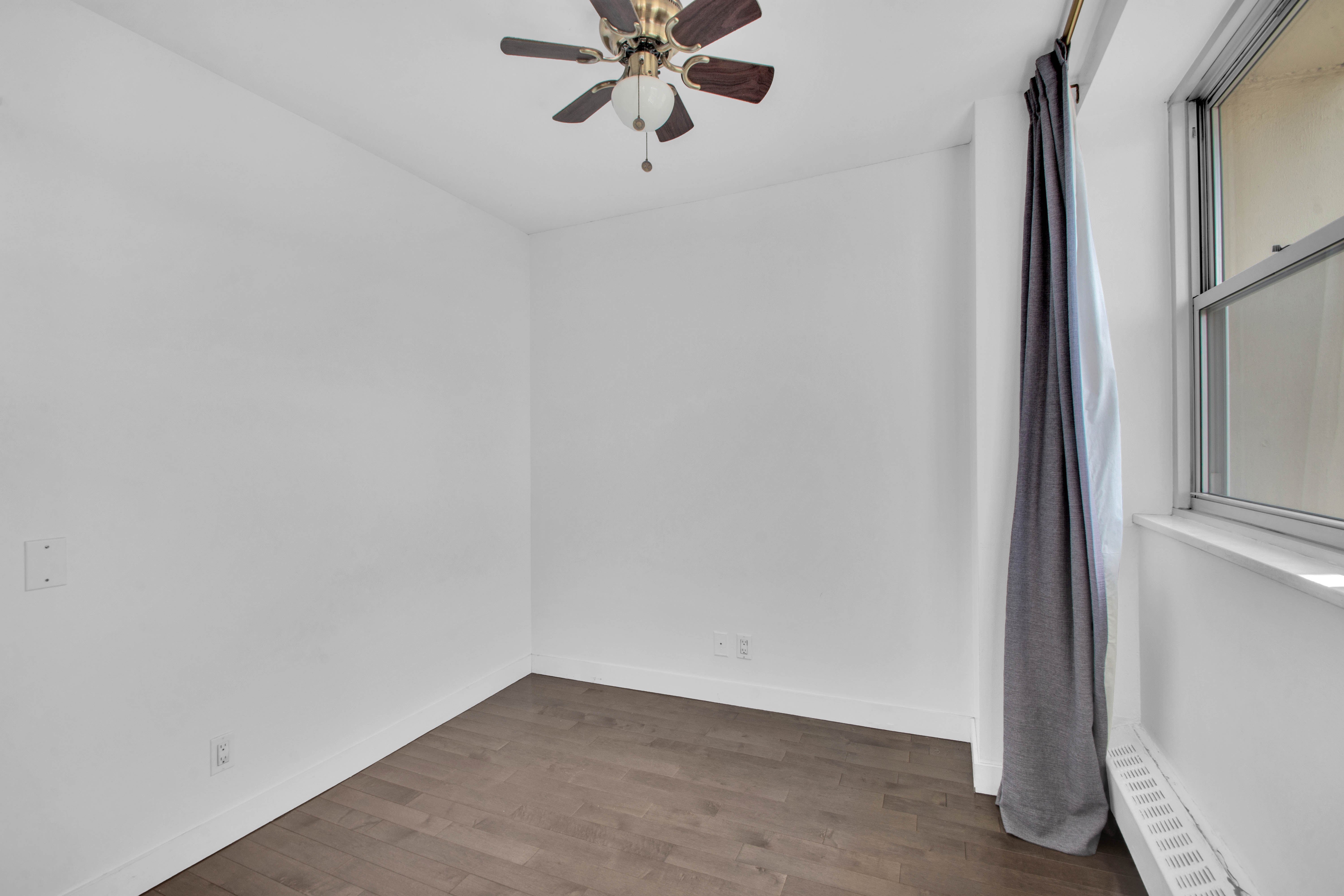 75 Henry Street, Unit 29J Brooklyn, NY 11201 - Photo 2 of 16 a view of an empty room with a window