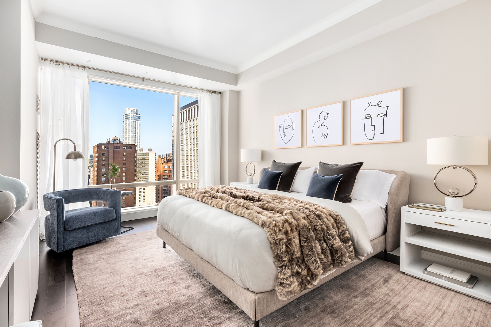 1 Central Park West, Unit 30E Manhattan, NY 10023 - Photo 5 of 12 a bedroom with bed and a couch