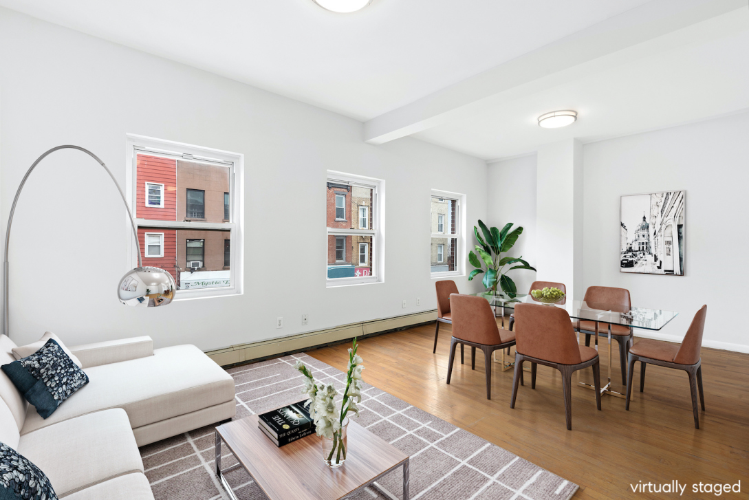 120 Smith Street, Unit 1 Brooklyn, NY 11201 - Photo 3 of 11 a living room with furniture and wooden floor