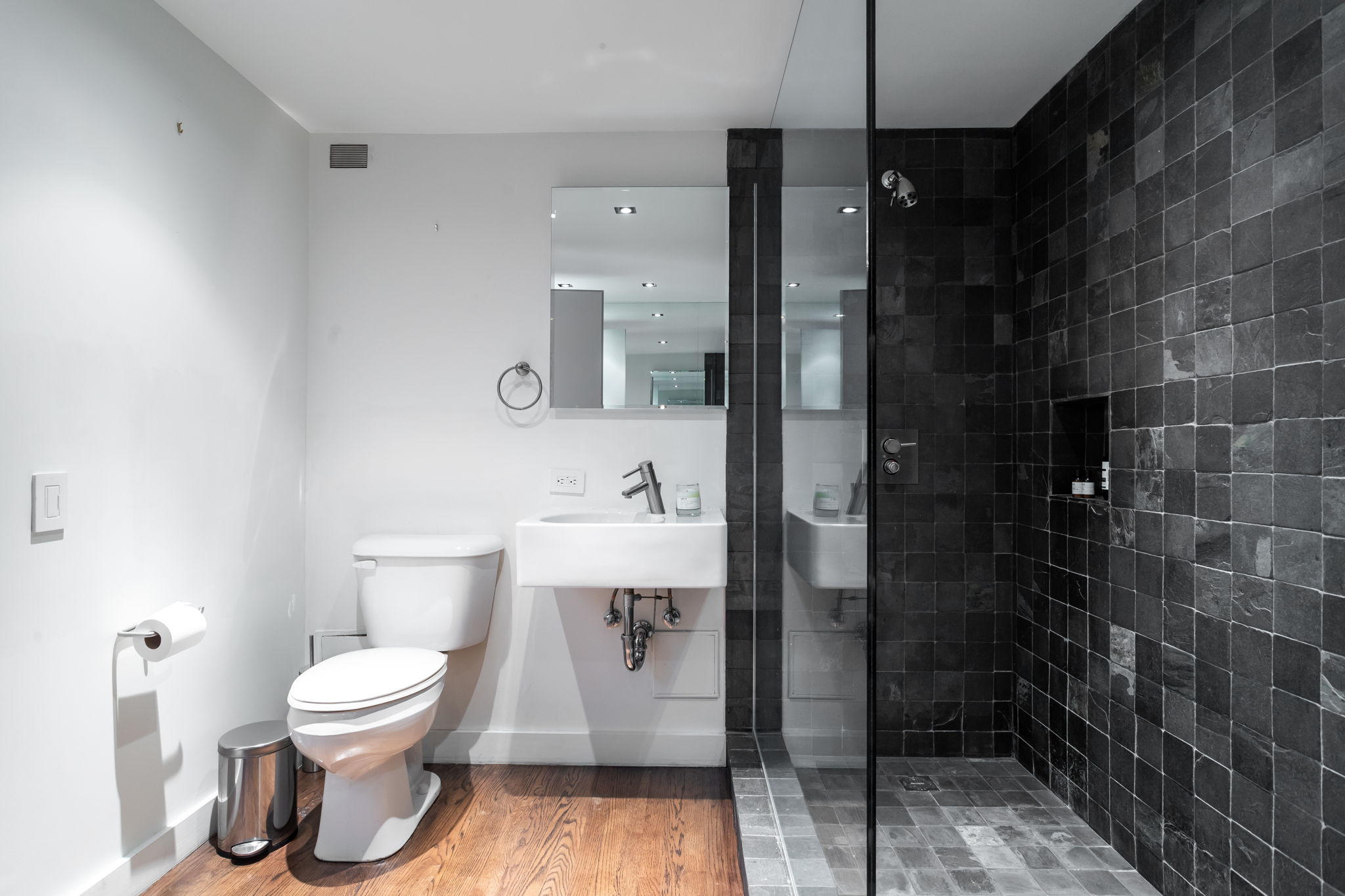 240 Centre Street, Unit 3H Manhattan, NY 10013 - Photo 13 of 20 a bathroom with a toilet and a shower