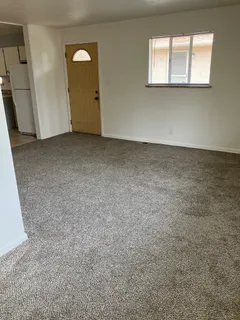 an empty room with window