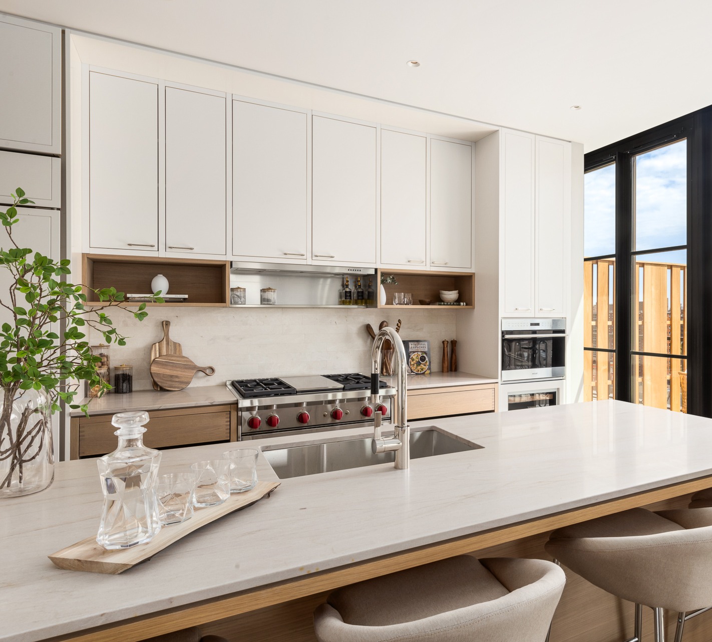 250 West 96th Street, Unit 19D Manhattan, NY 10025 - Photo 4 of 34 a kitchen with a table and chairs