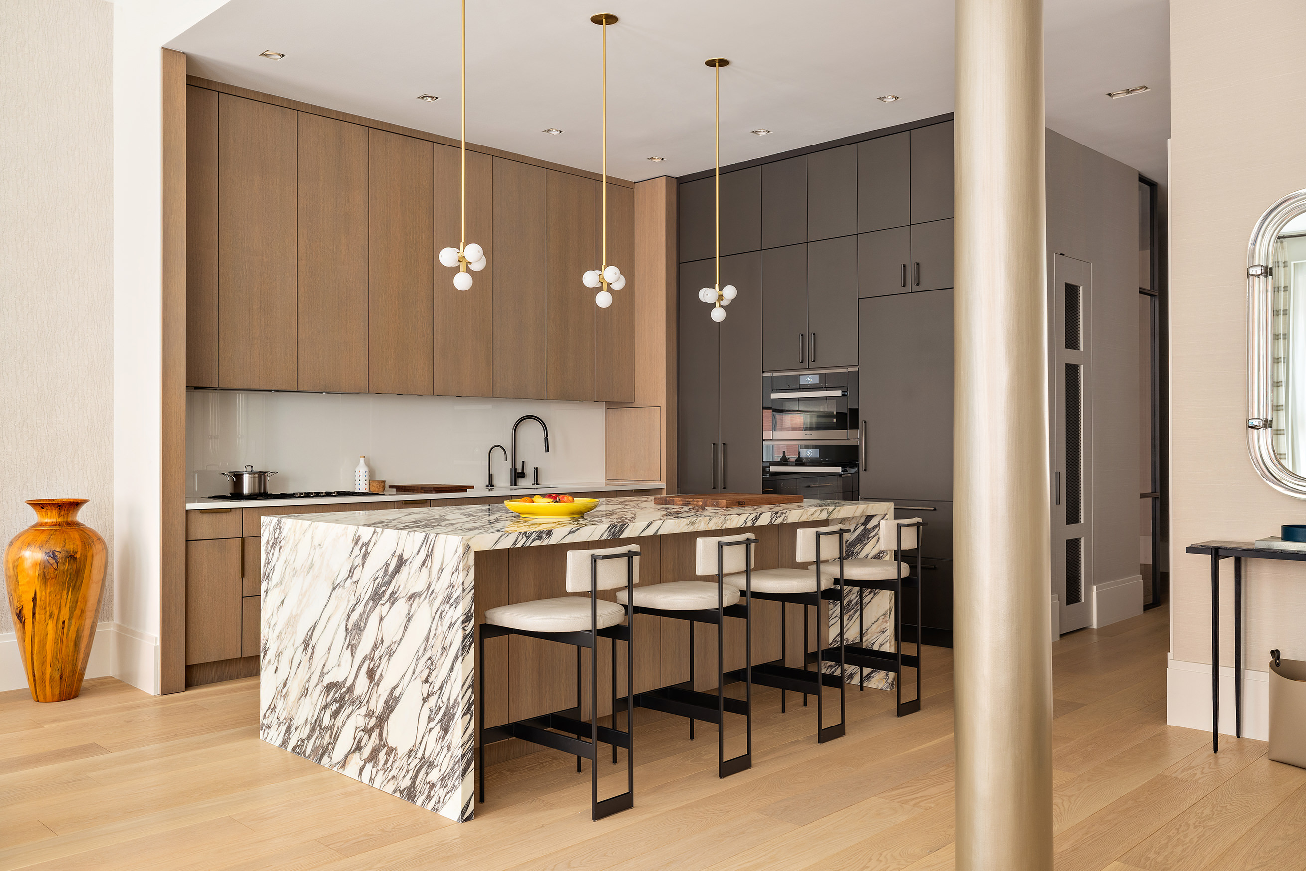 53 Greene Street, Unit 3 Manhattan, NY 10013 - Photo 9 of 22 a kitchen with a table and chairs in it