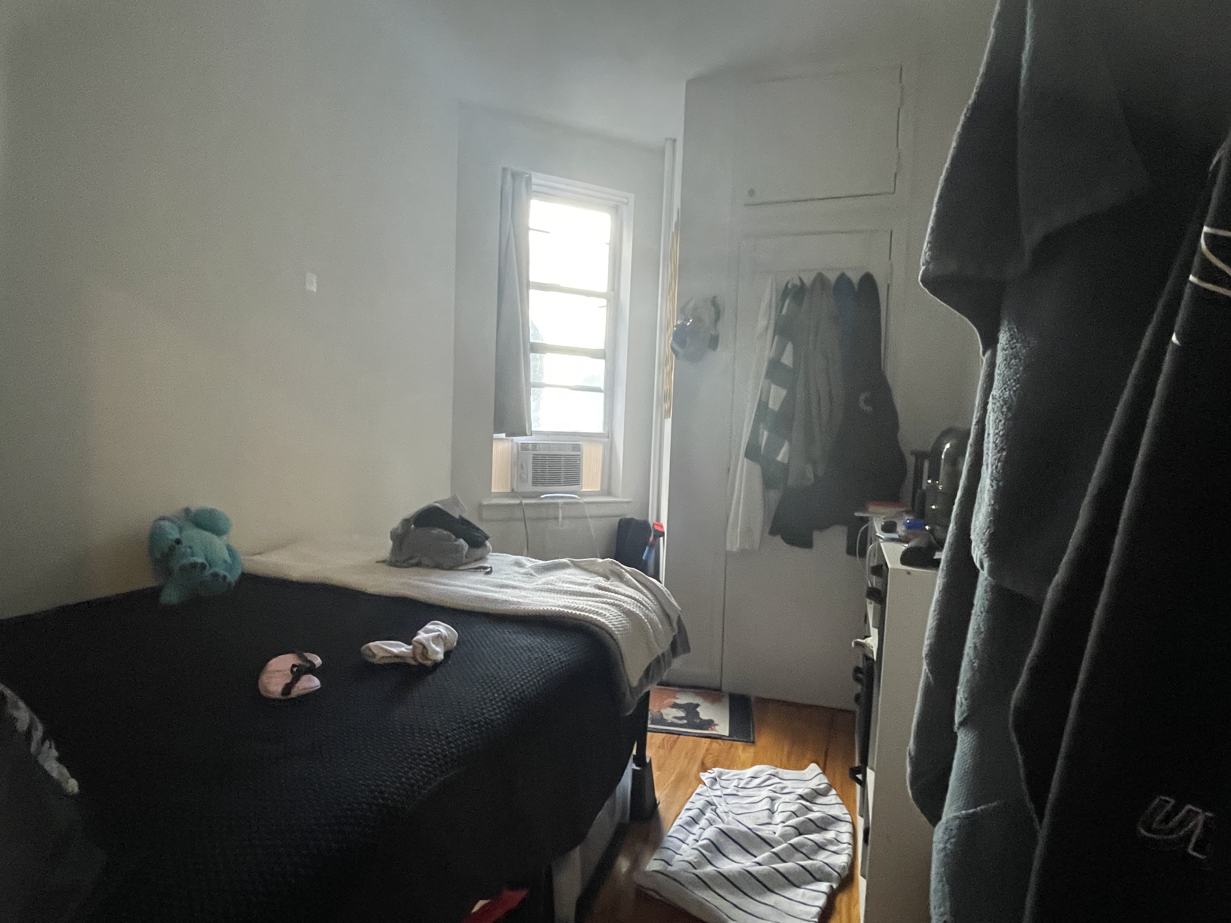 1716 2nd Avenue, Unit 4C Manhattan, NY 10128 - Photo 6 of 13 a bedroom with a bed and a window
