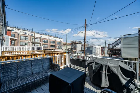 a picture of a bathroom with a shower