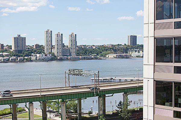 100 Riverside Boulevard, Unit 9D Manhattan, NY 10069 - Photo 5 of 14 a view of a city with tall buildings